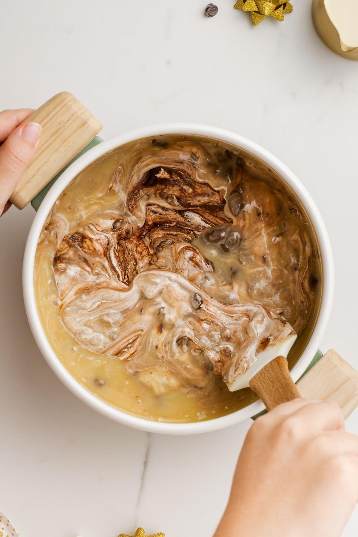 melted butter, marshmallow creme and butter mixture in a pot.