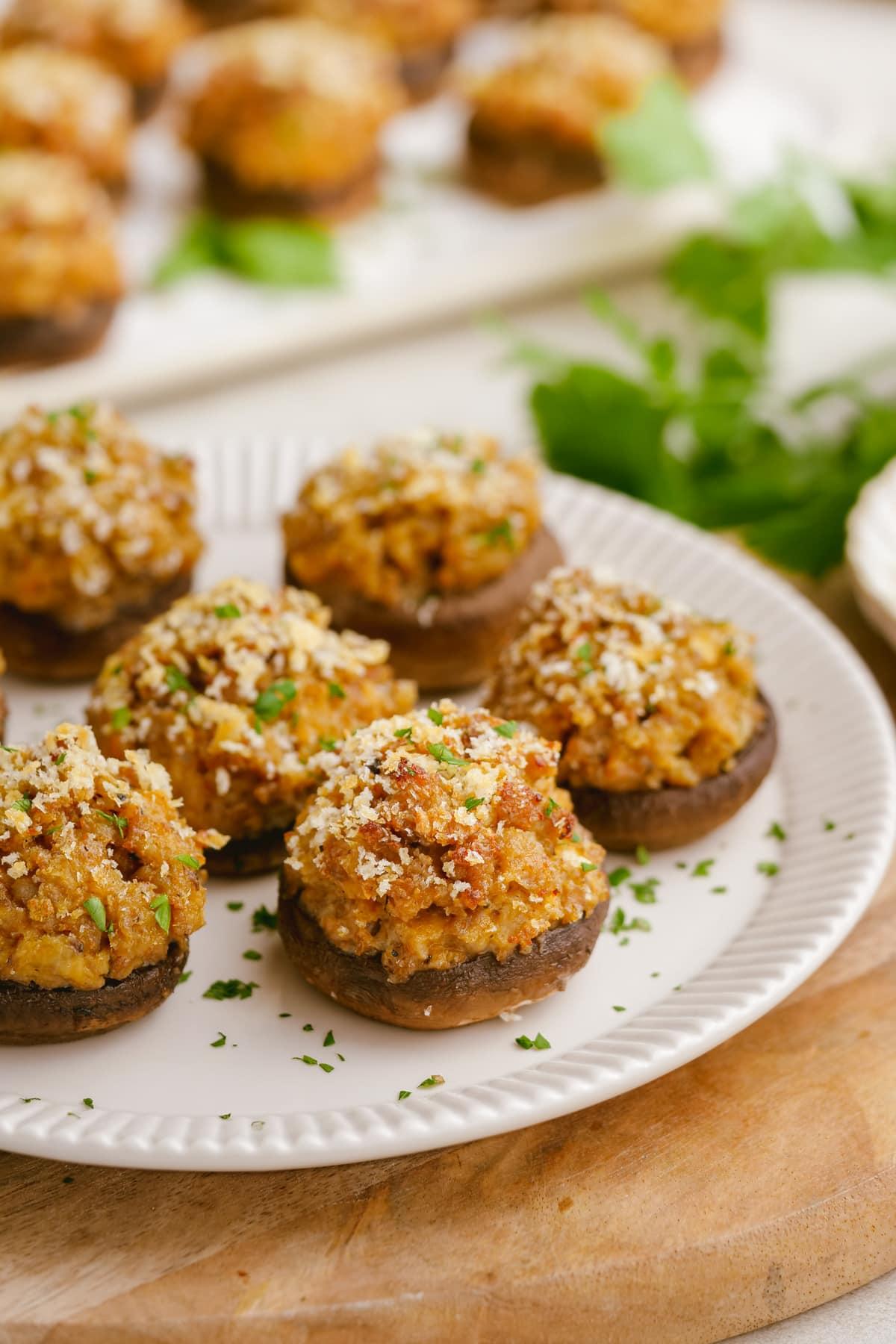 cooked sausage-stuffed-mushrooms on plate