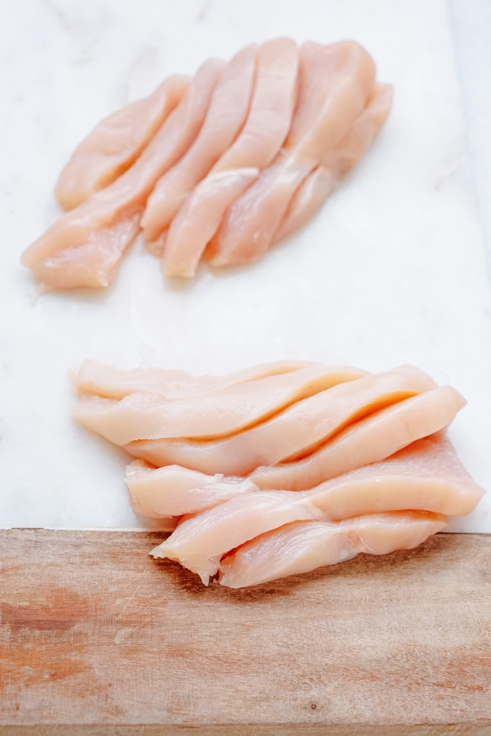 sliced raw chicken strips