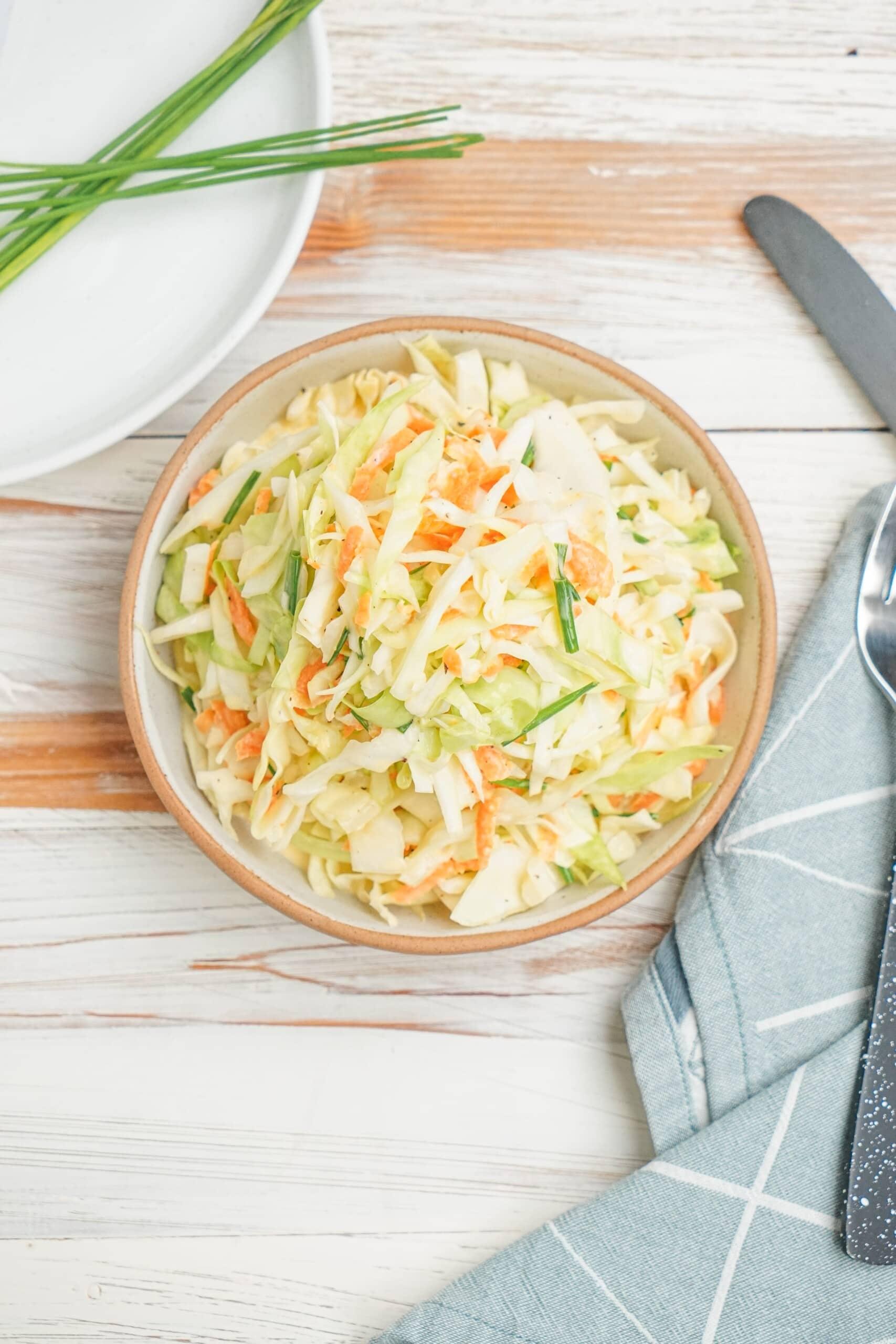 coleslaw in serving bowl on a tablescape