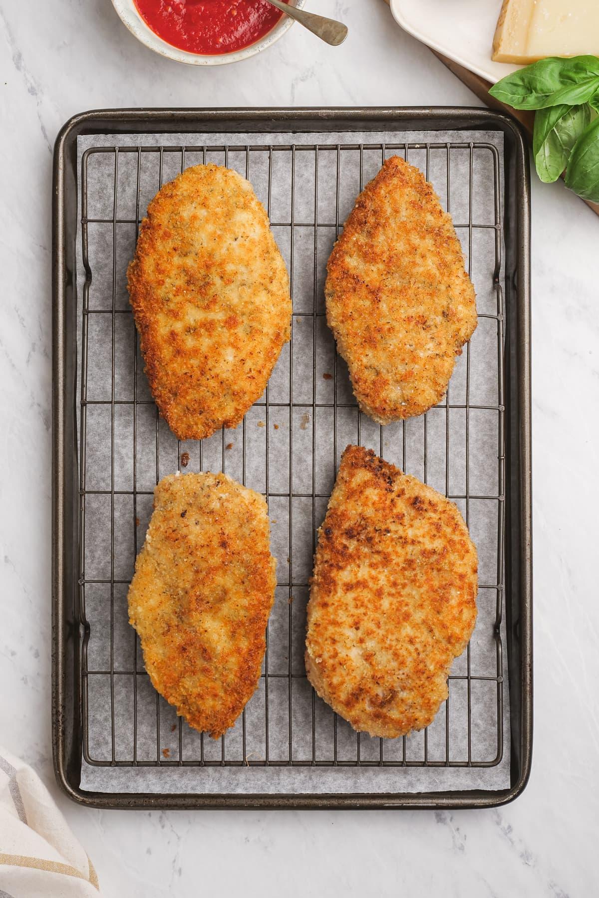 chicken breast cooling on cooling rack