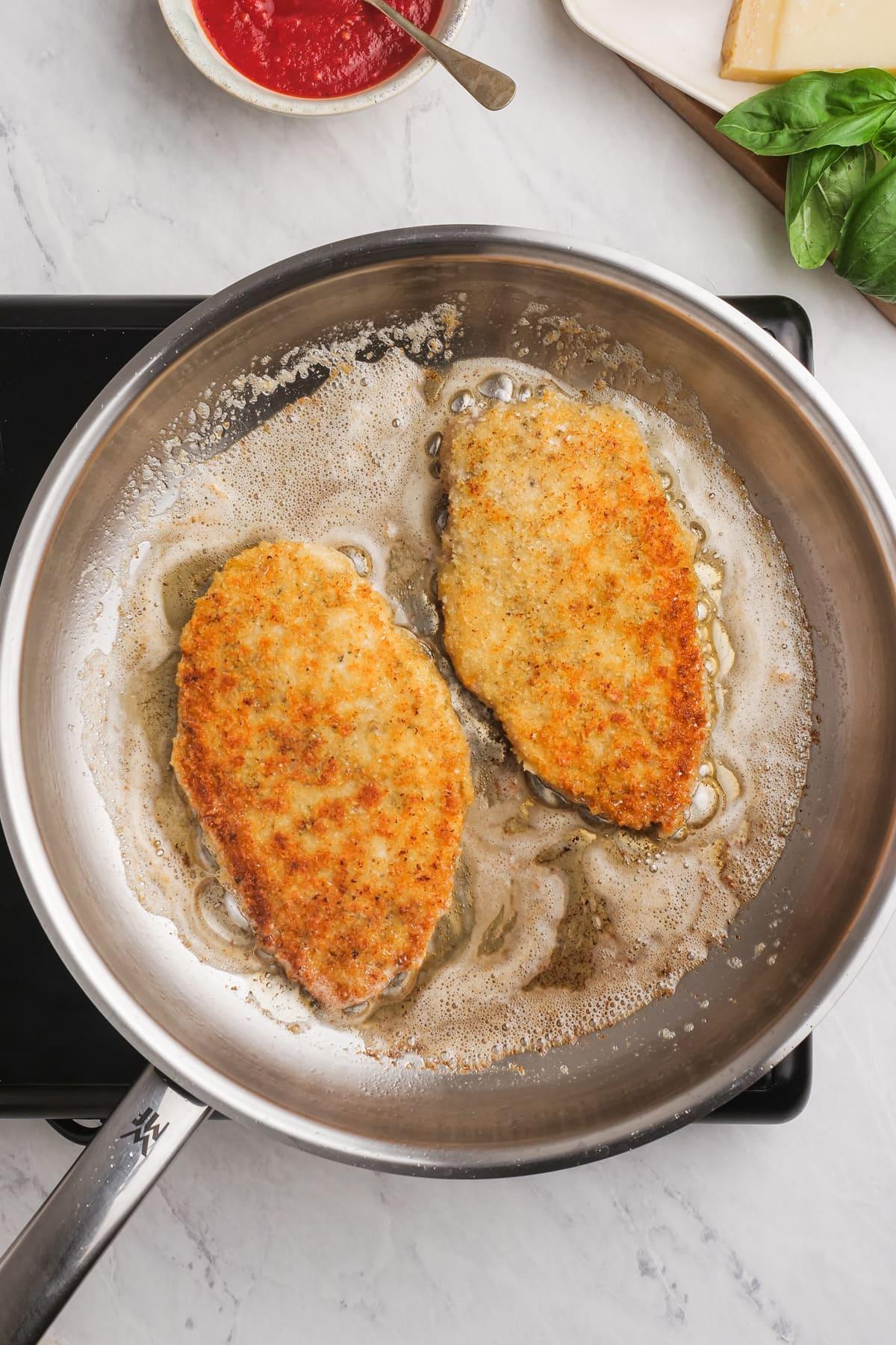 fried chicken breast in a skillet