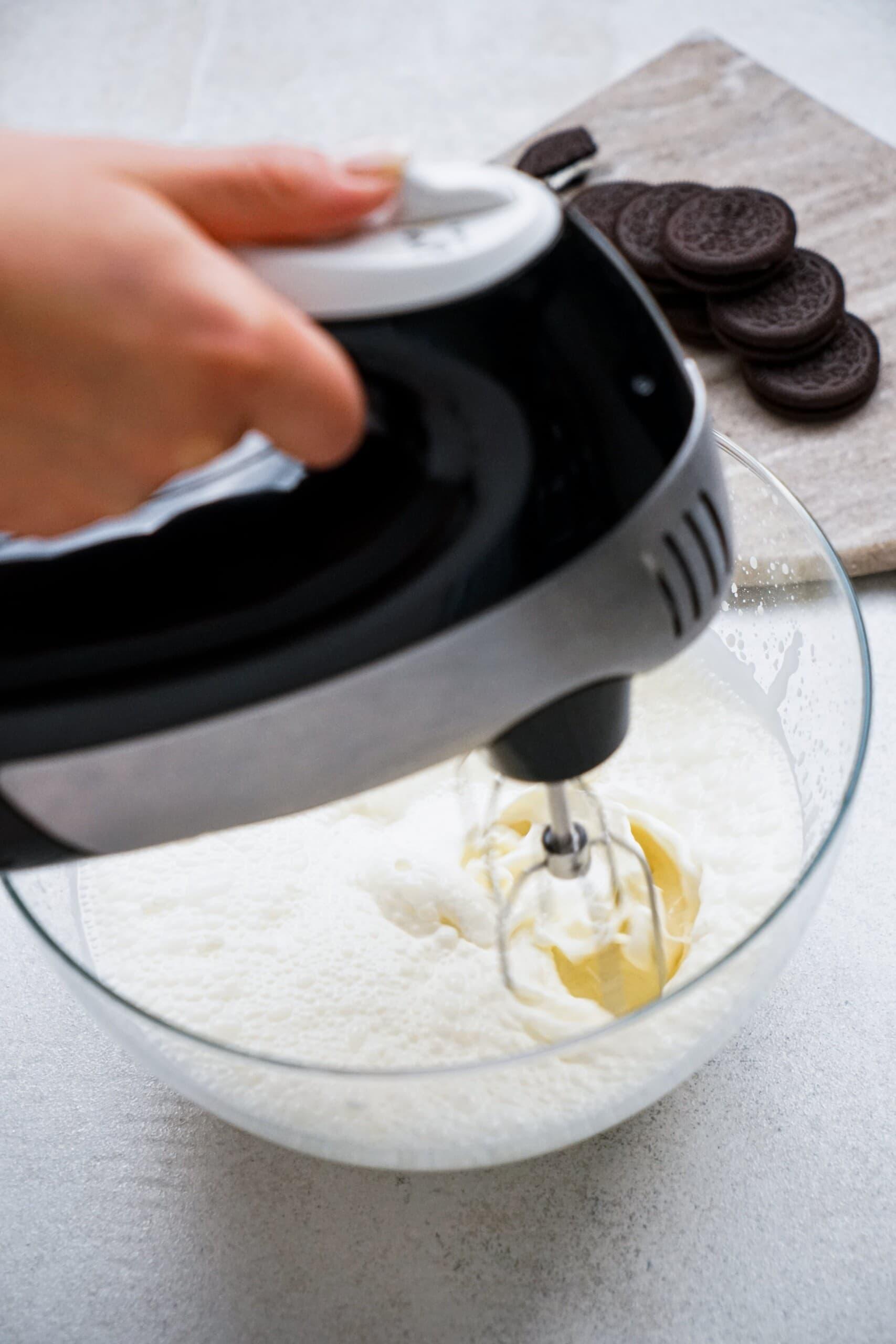 electric hand mixer whipping 