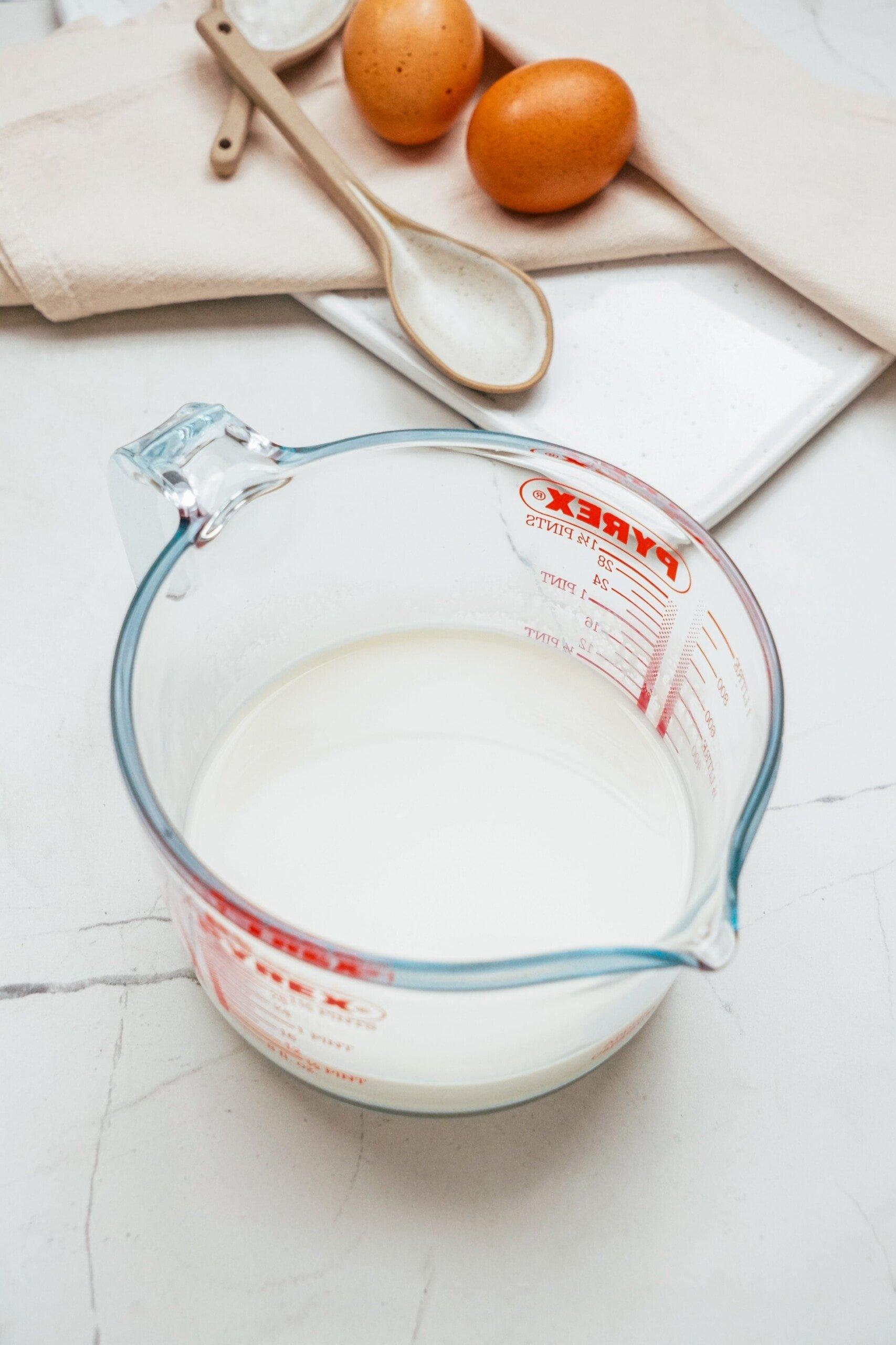 milk in a glass measuring cup