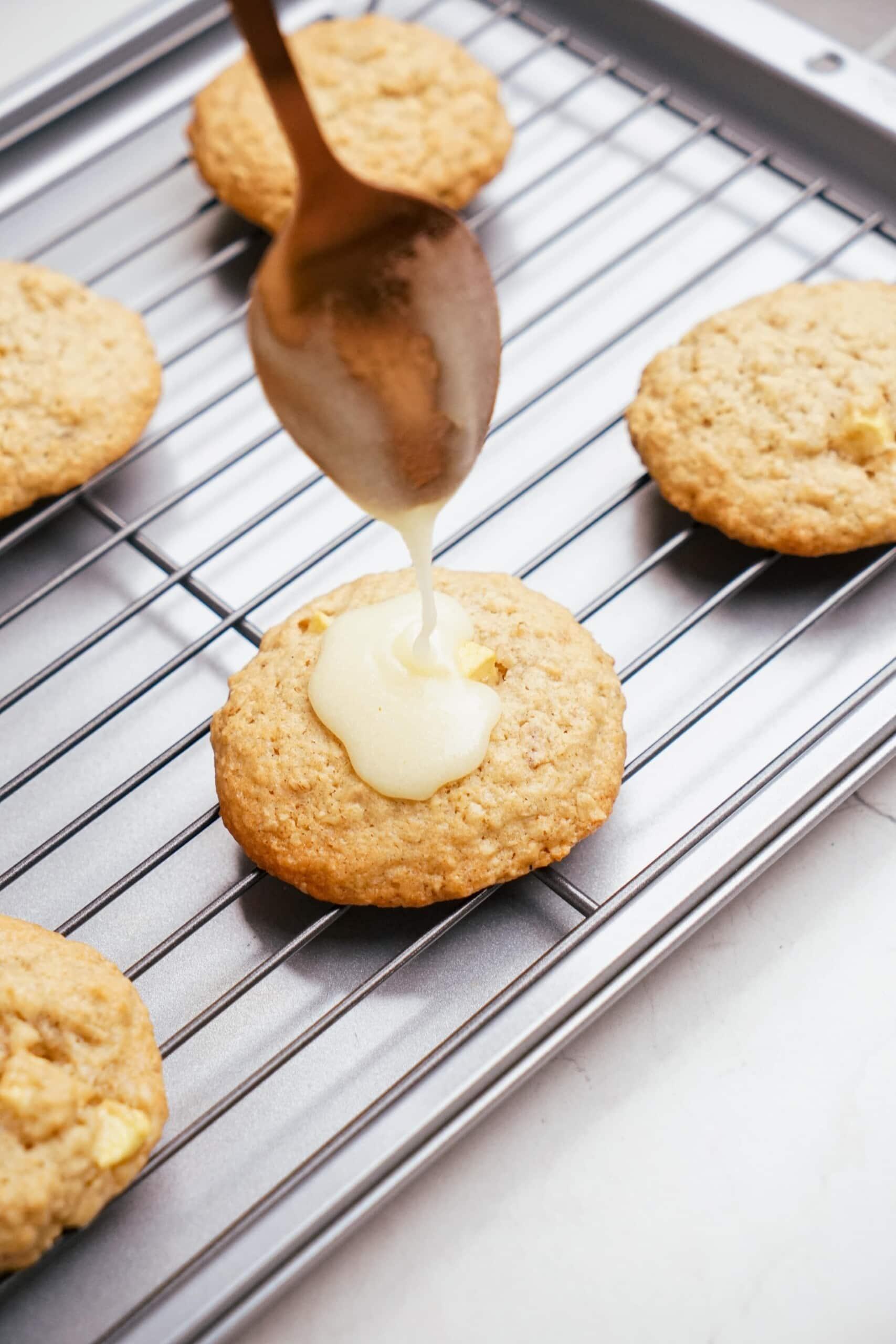 brown butter frosting drizzled on a cookie