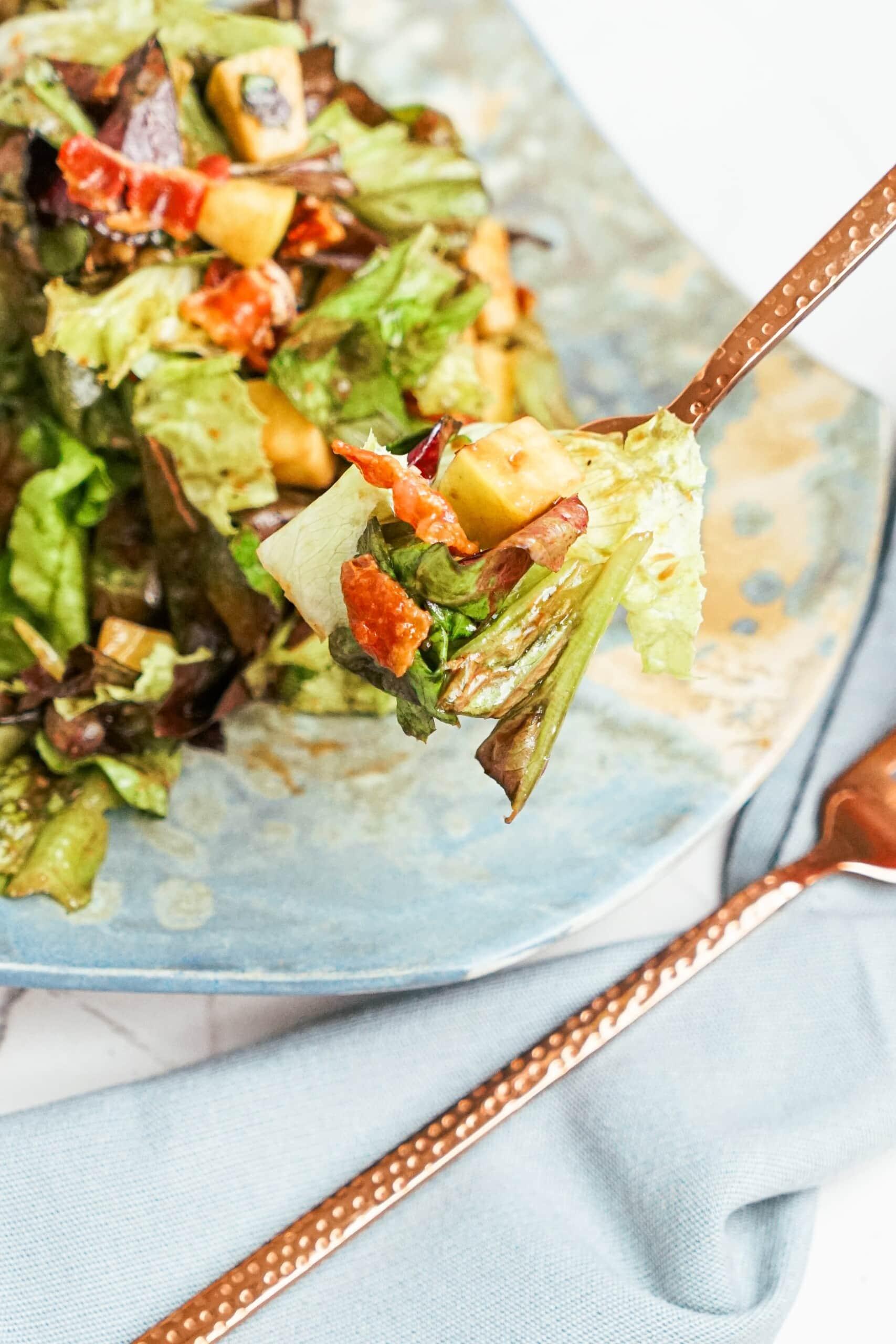 bite of salad on a fork