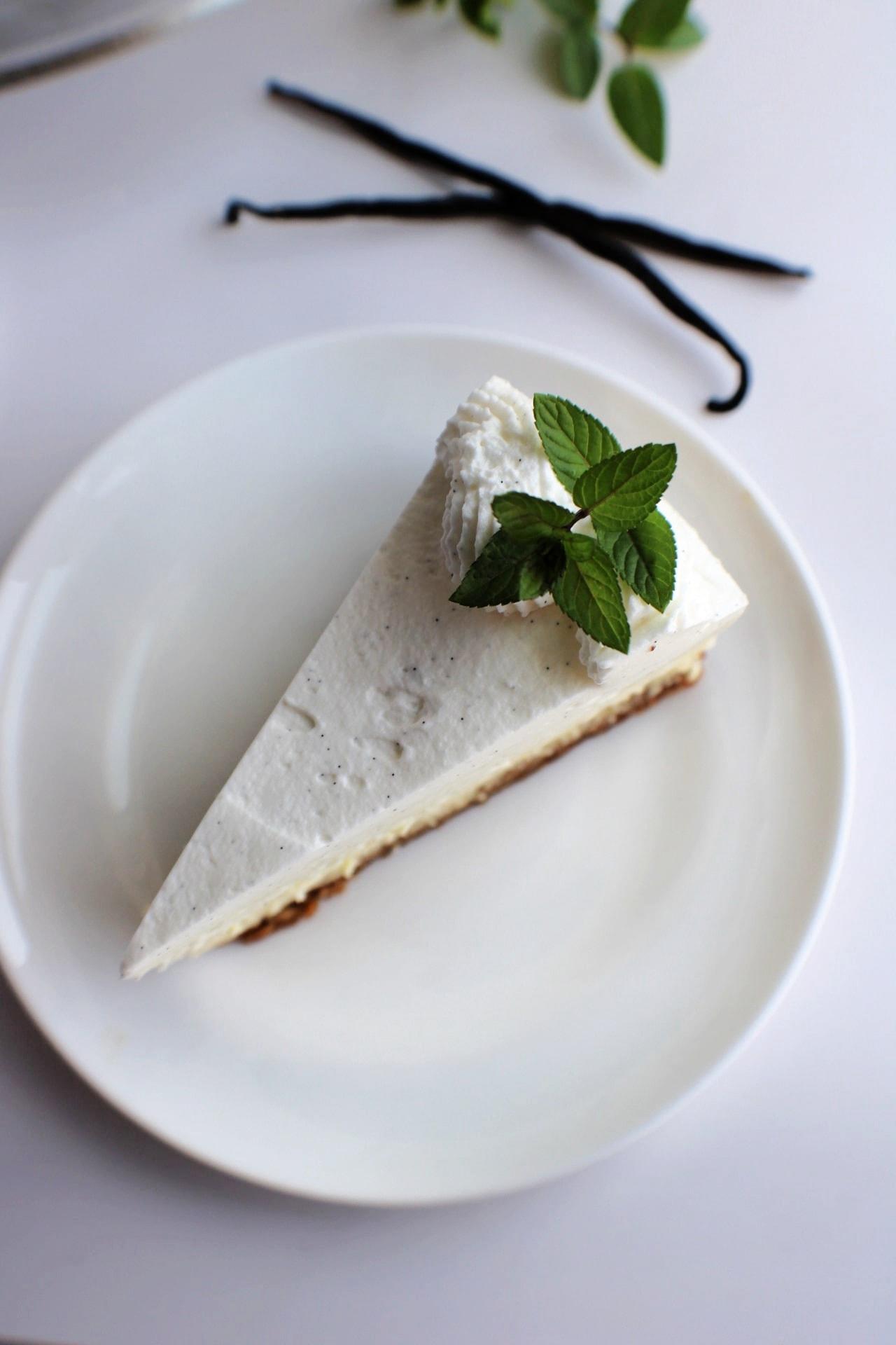 slice of Vanilla Bean Cheesecake on plate