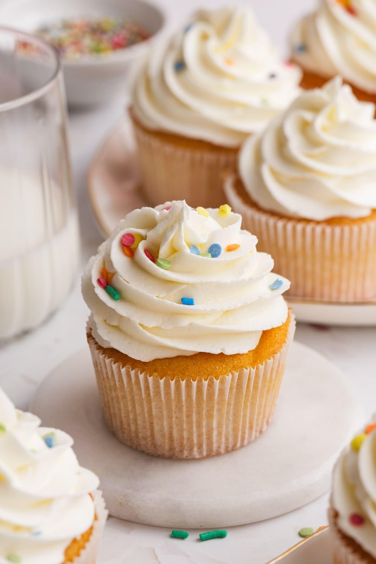 buttercream frosting on a vanilla cupcake