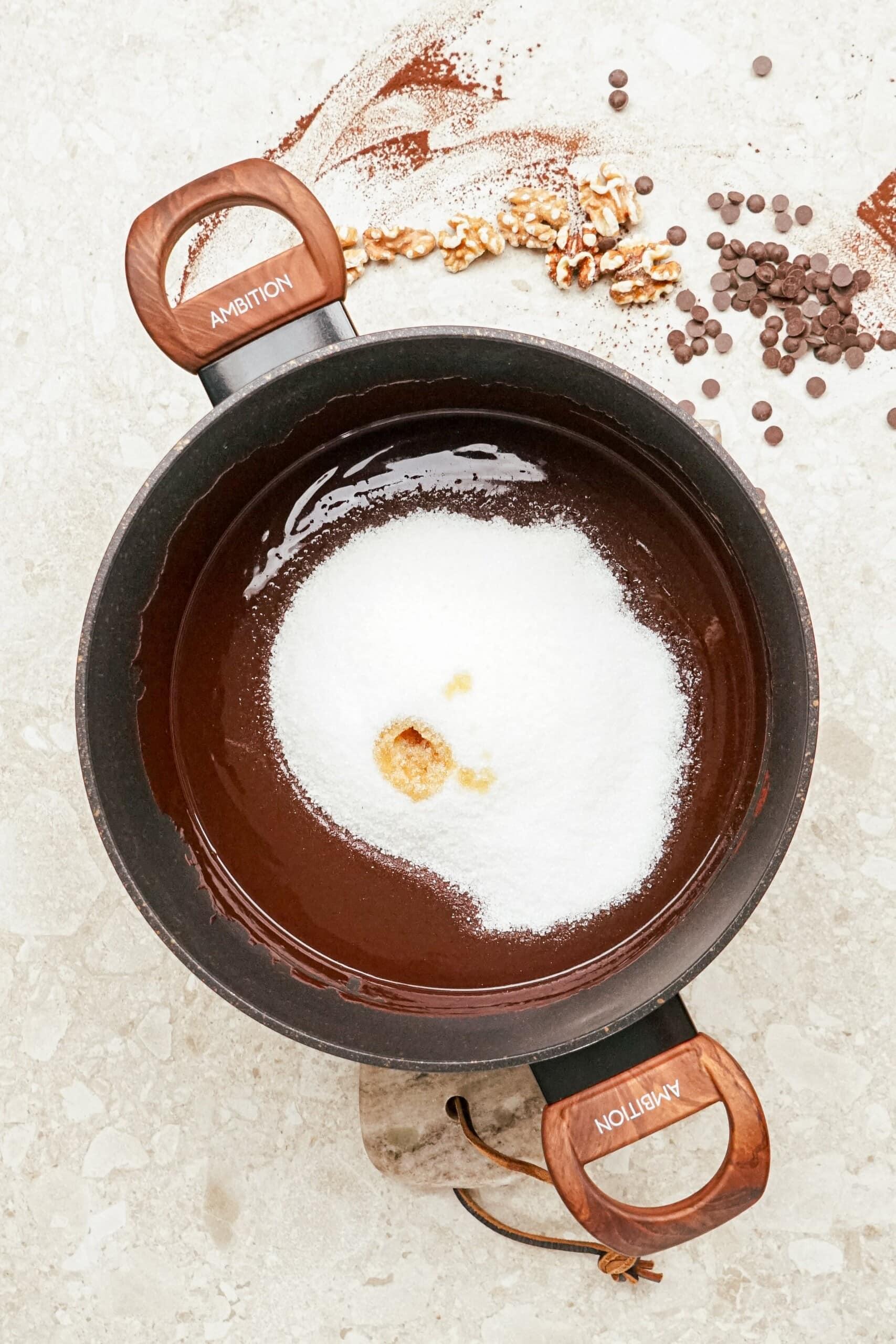 granulated sugar added to melted chocolate mixture