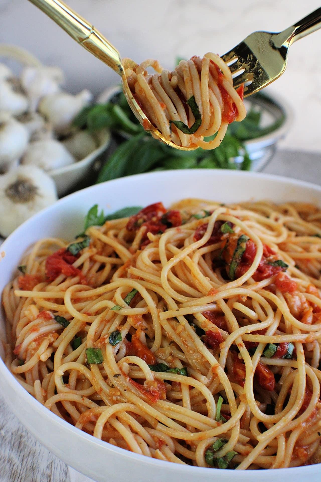 Roasted Tomatoes Pasta in a bowl and twirled onto a fork