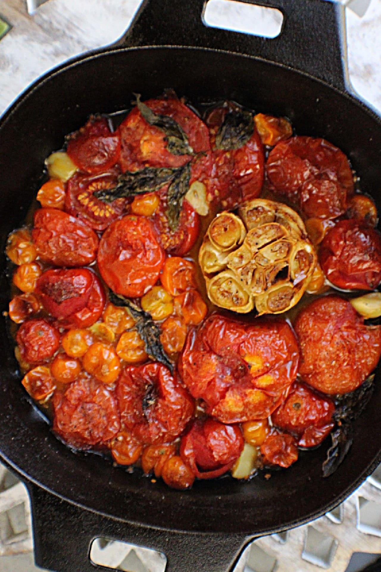 Roasted Tomatoes and garlic in a cast iron skillet