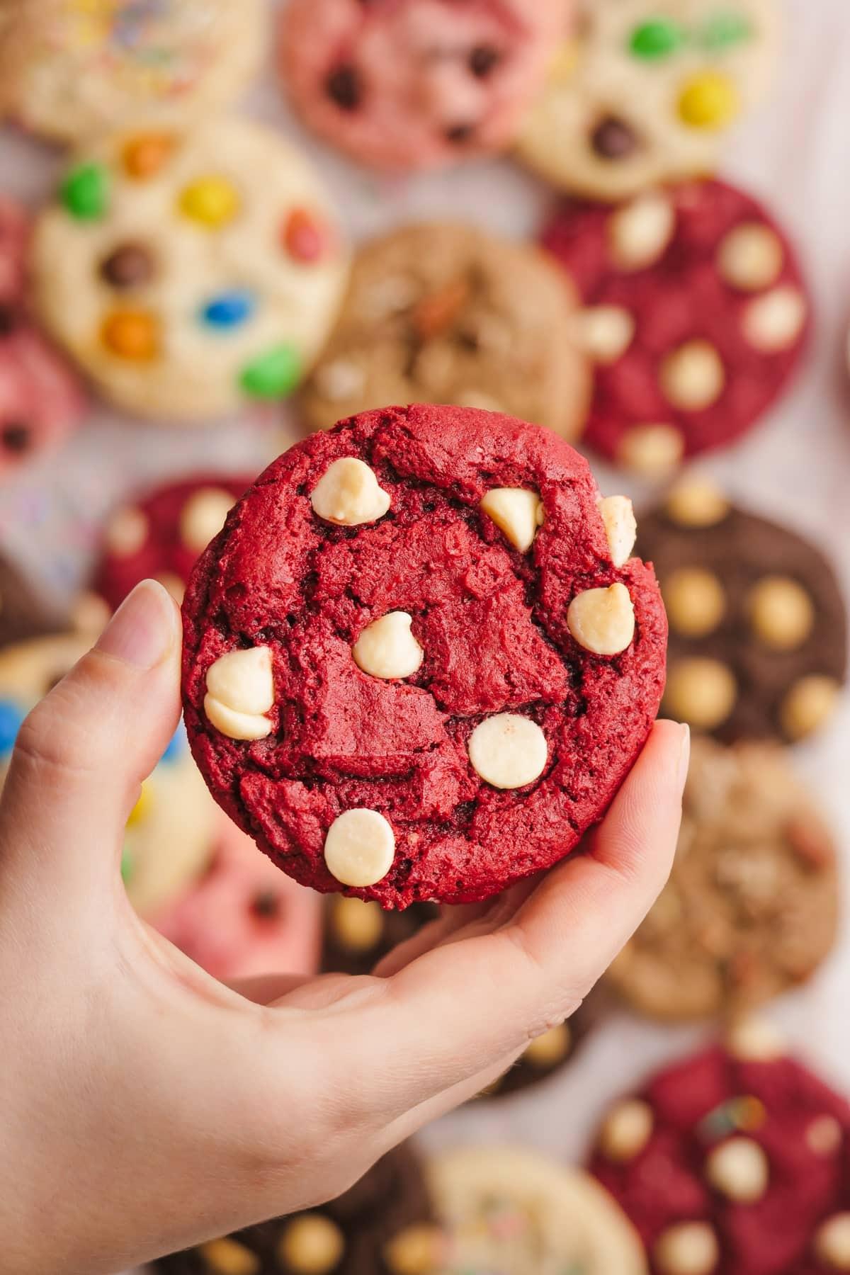 red velvet cake mix cookie in a woman's hand