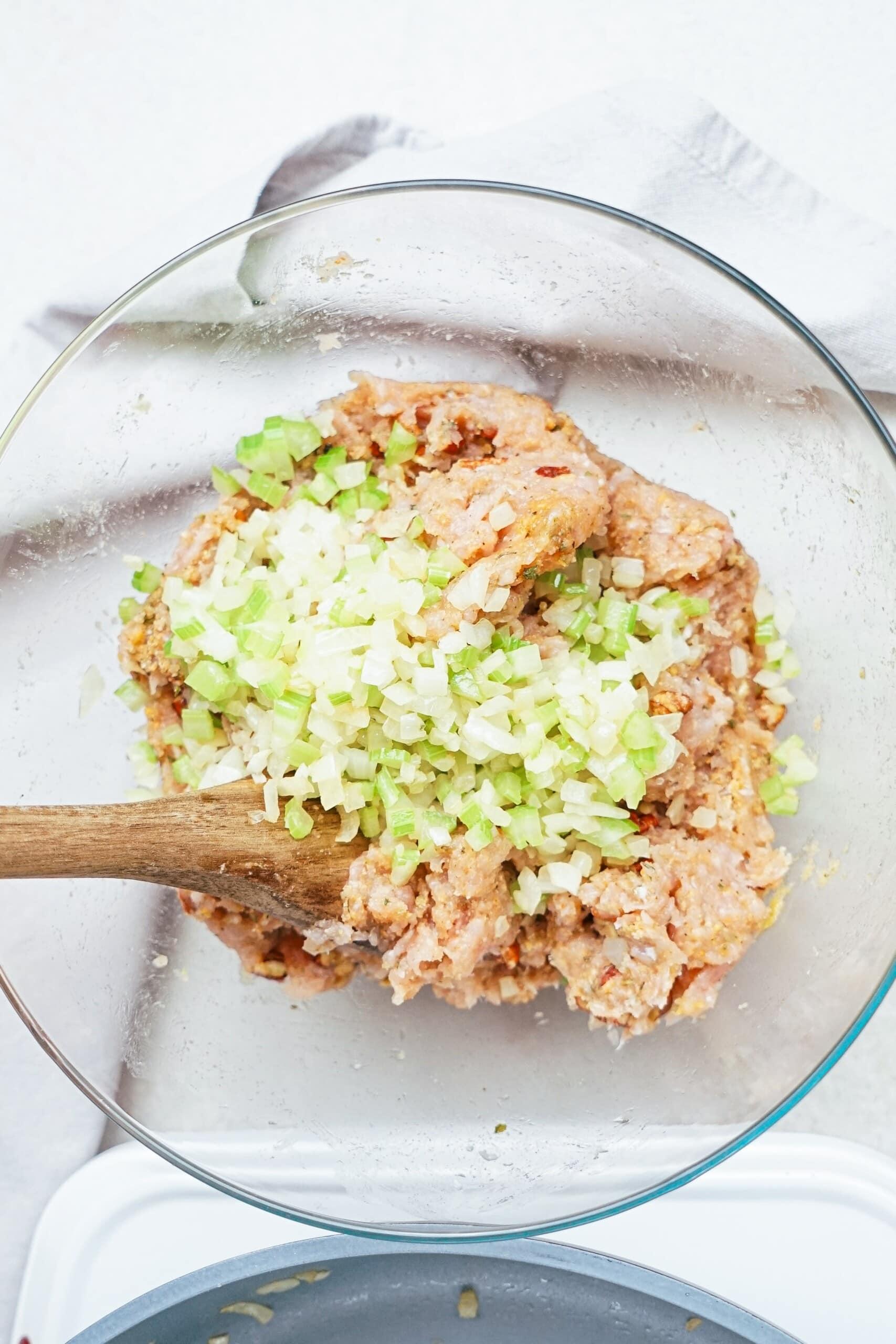 onions and celery added to the ingredient bowl