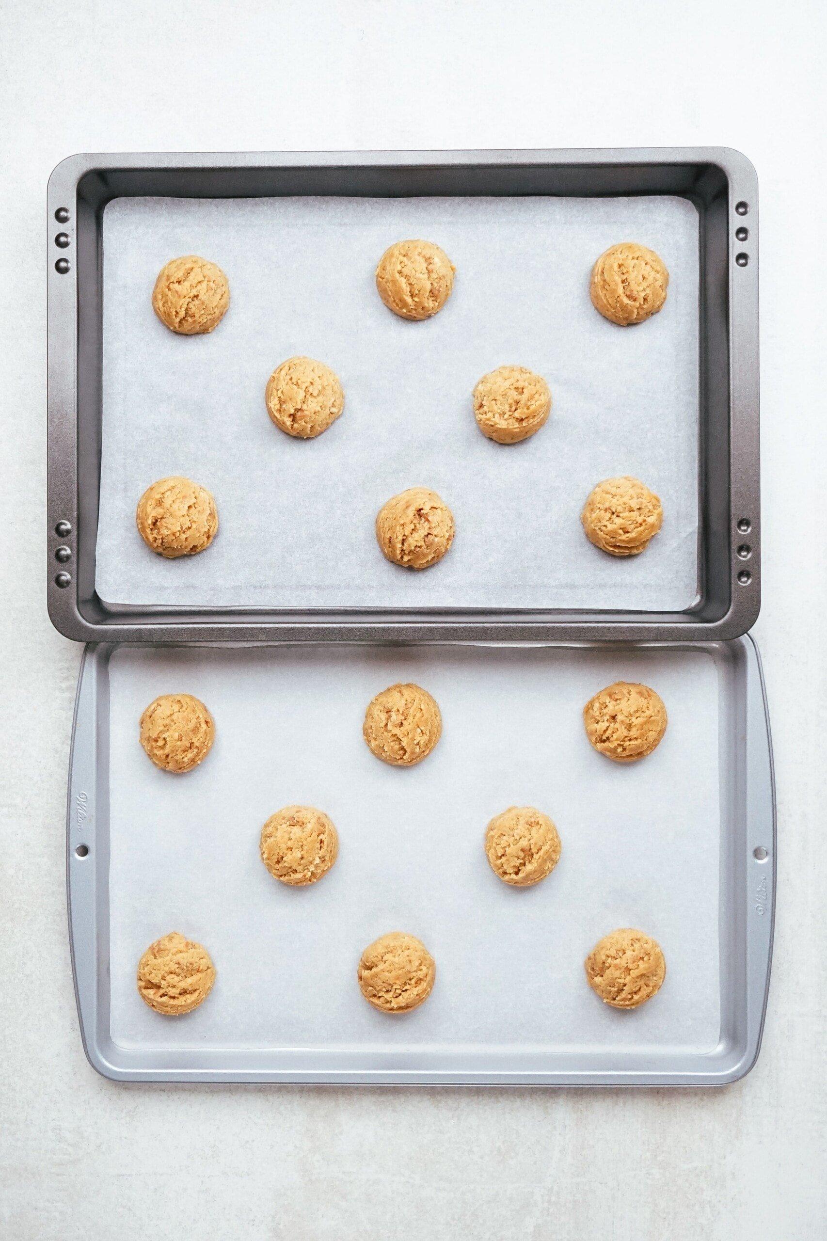 dough balls on a cookie sheet