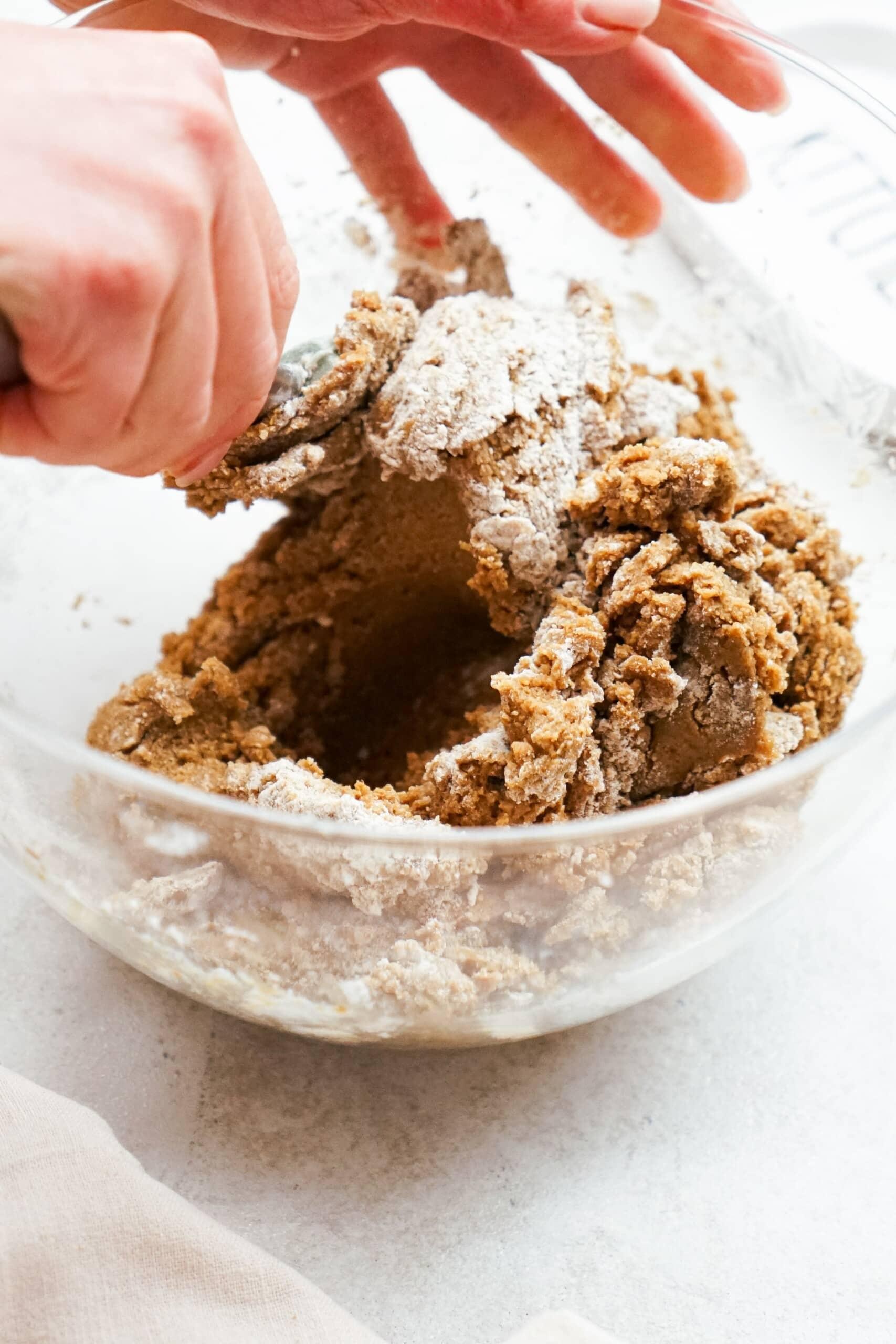 combining wet and dry ingredients with rubber spatula