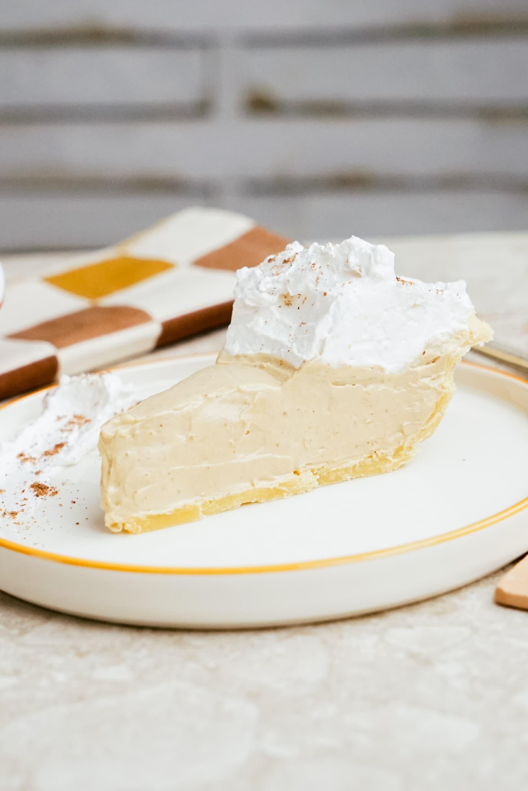 slice of gingerbread cream pie on a plate