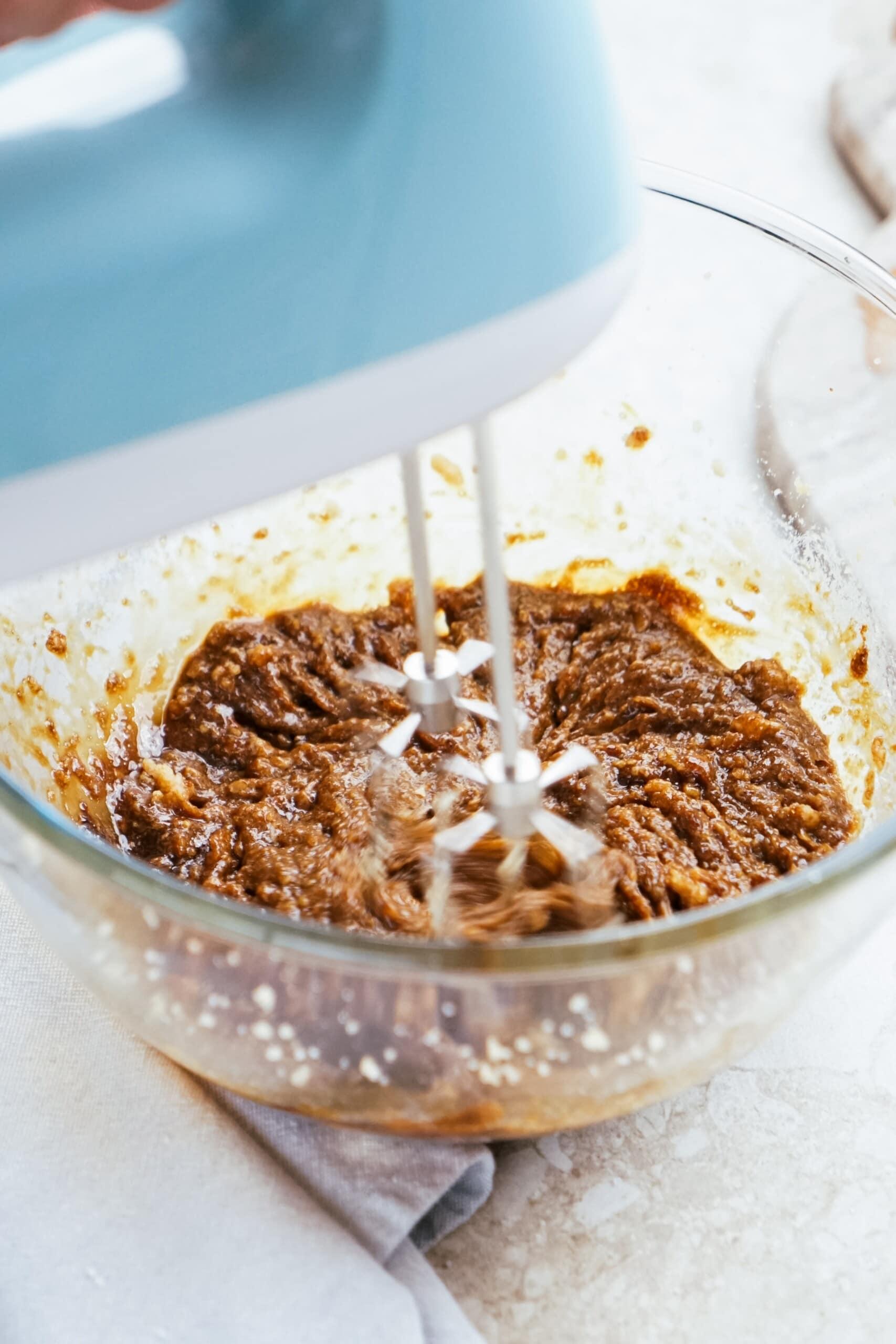 hand mixer mixing gingerbread mixture