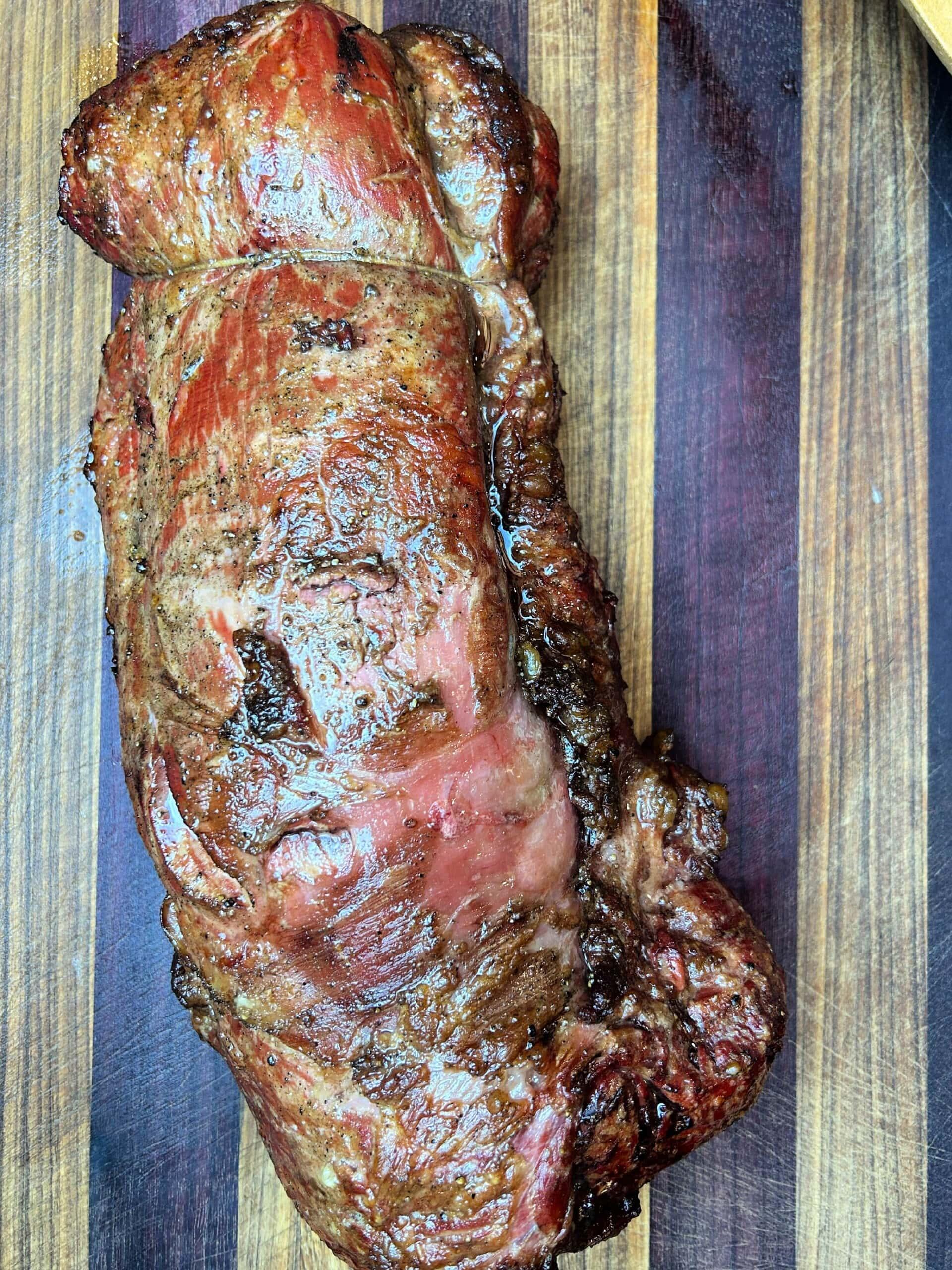 Smoked Beef Tenderloin on cutting board