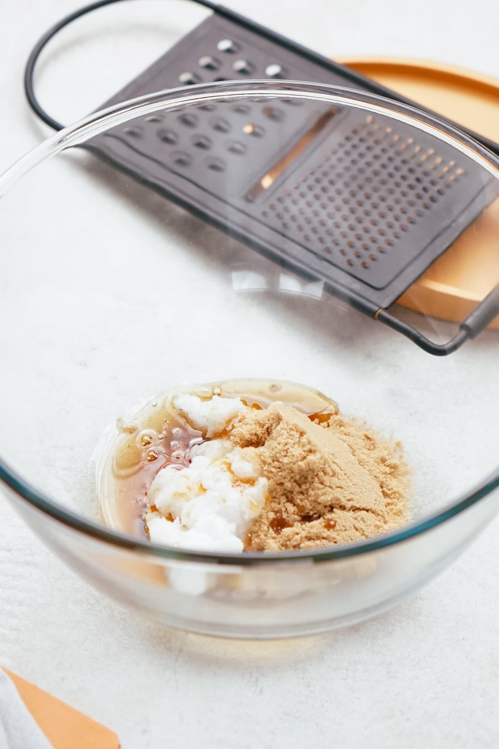 sugar and oil in a glass mixing bowl