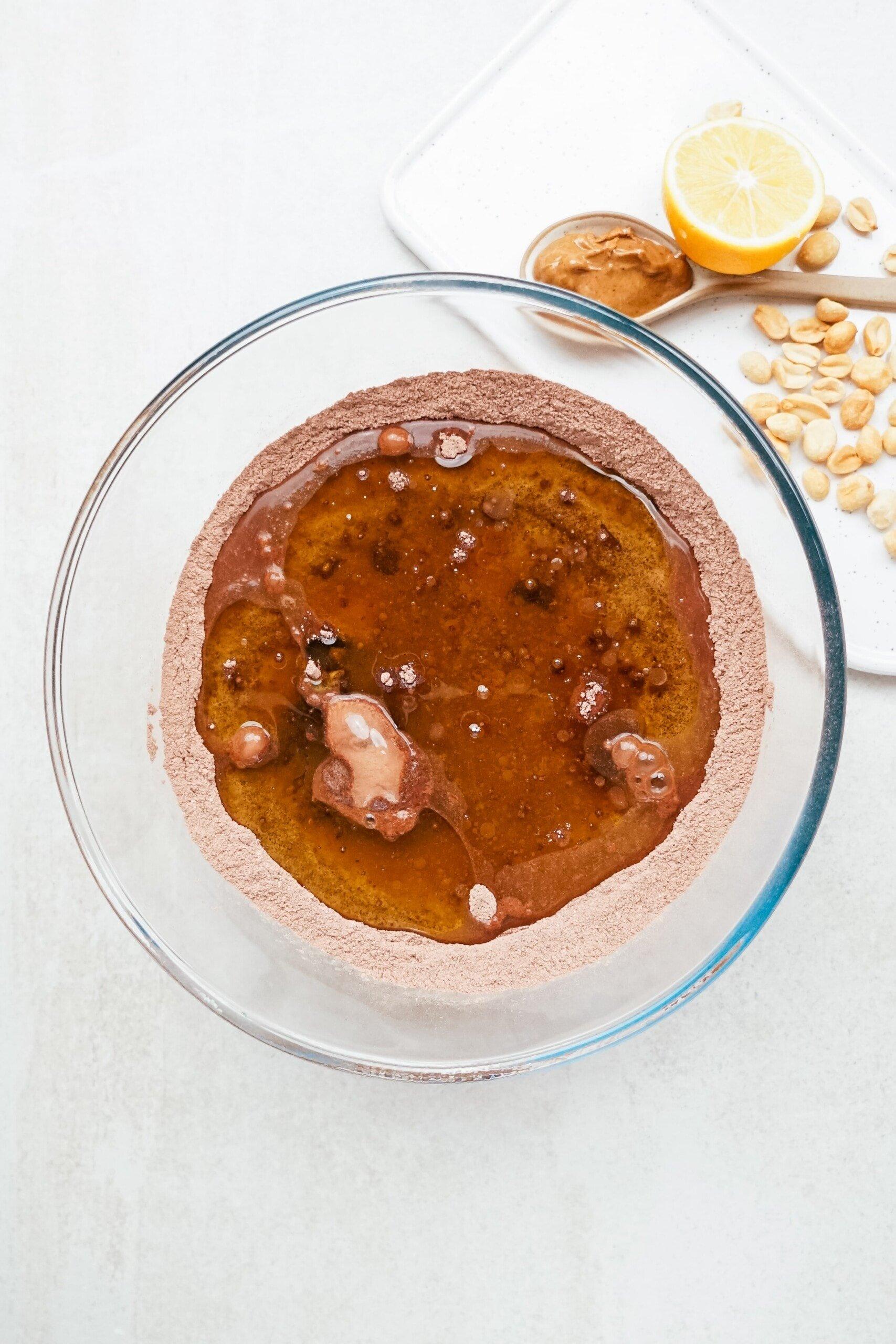 chocolate cake batter in a glass mixing bowl