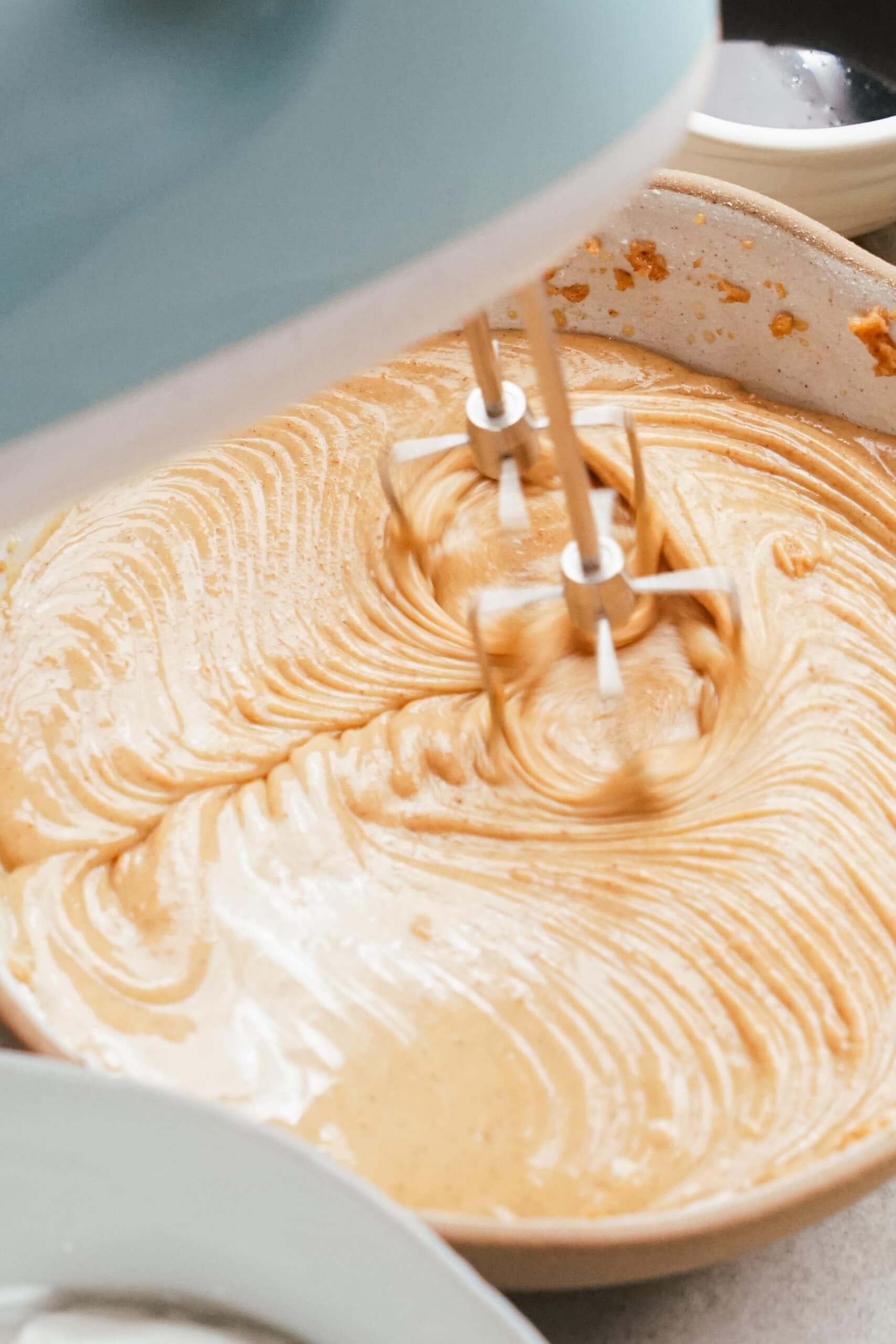 electric mixer combining peanut butter mixture