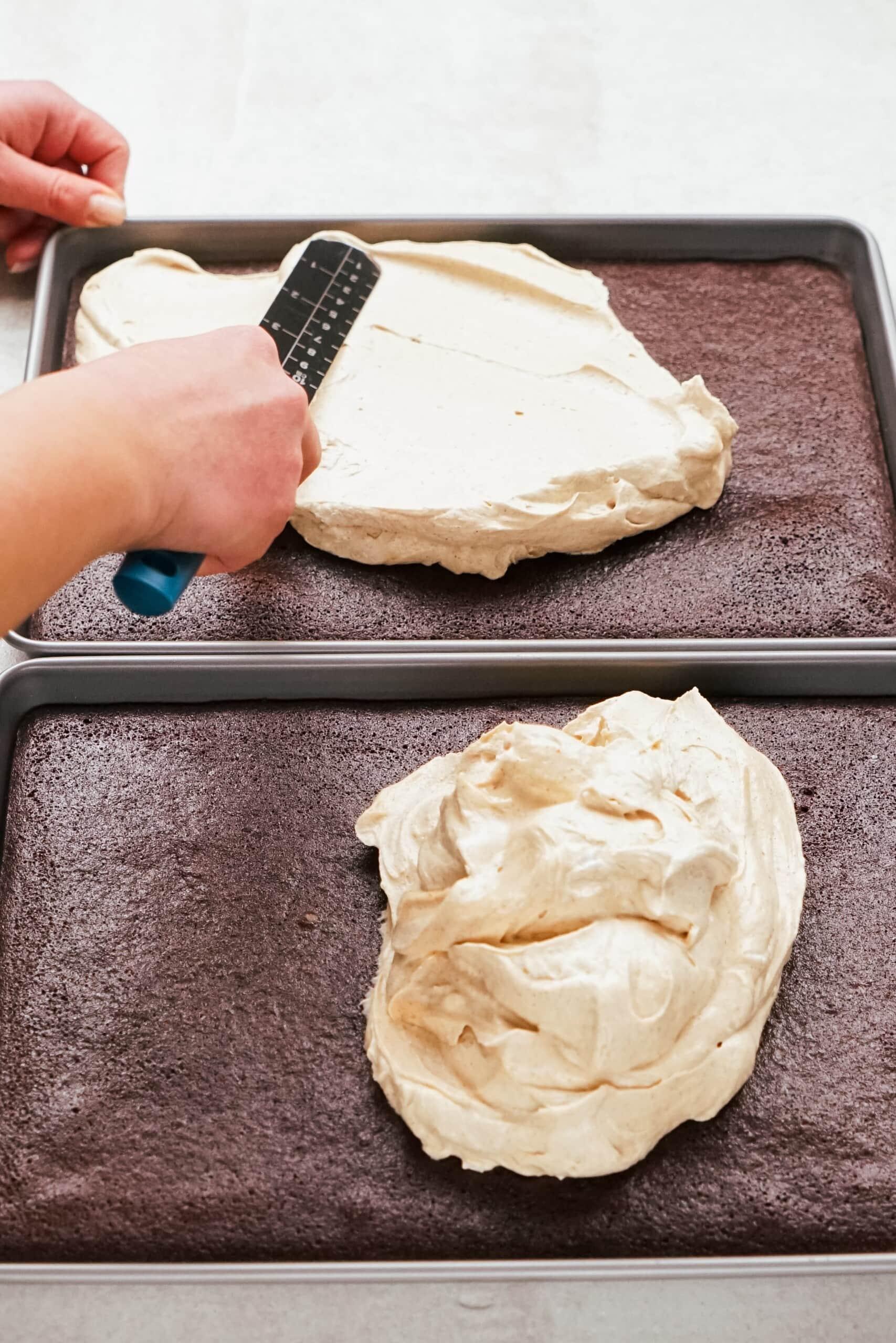 woman's spreading pb topping over cake with a spatula