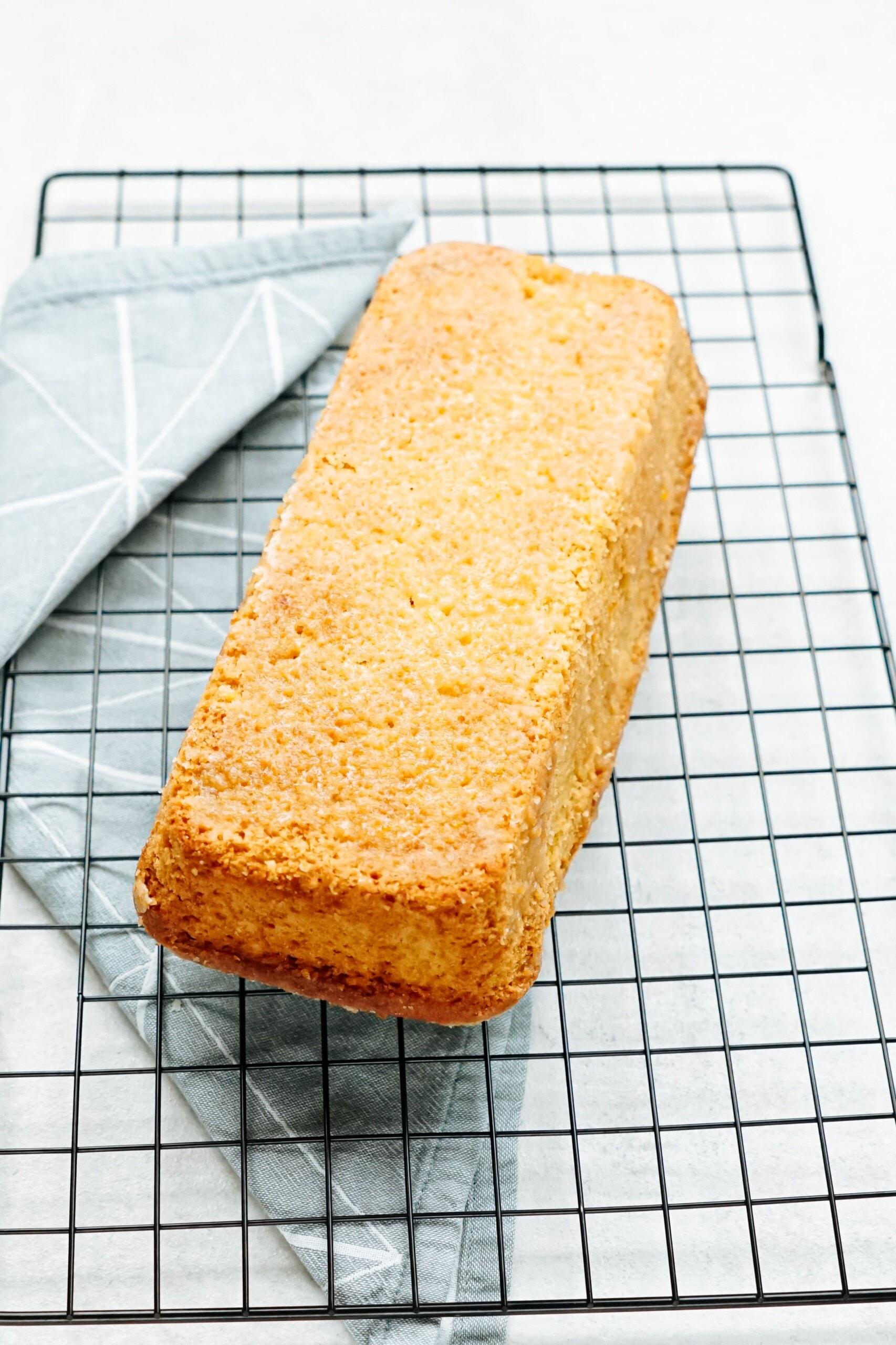 inverted cake on a wire rack 