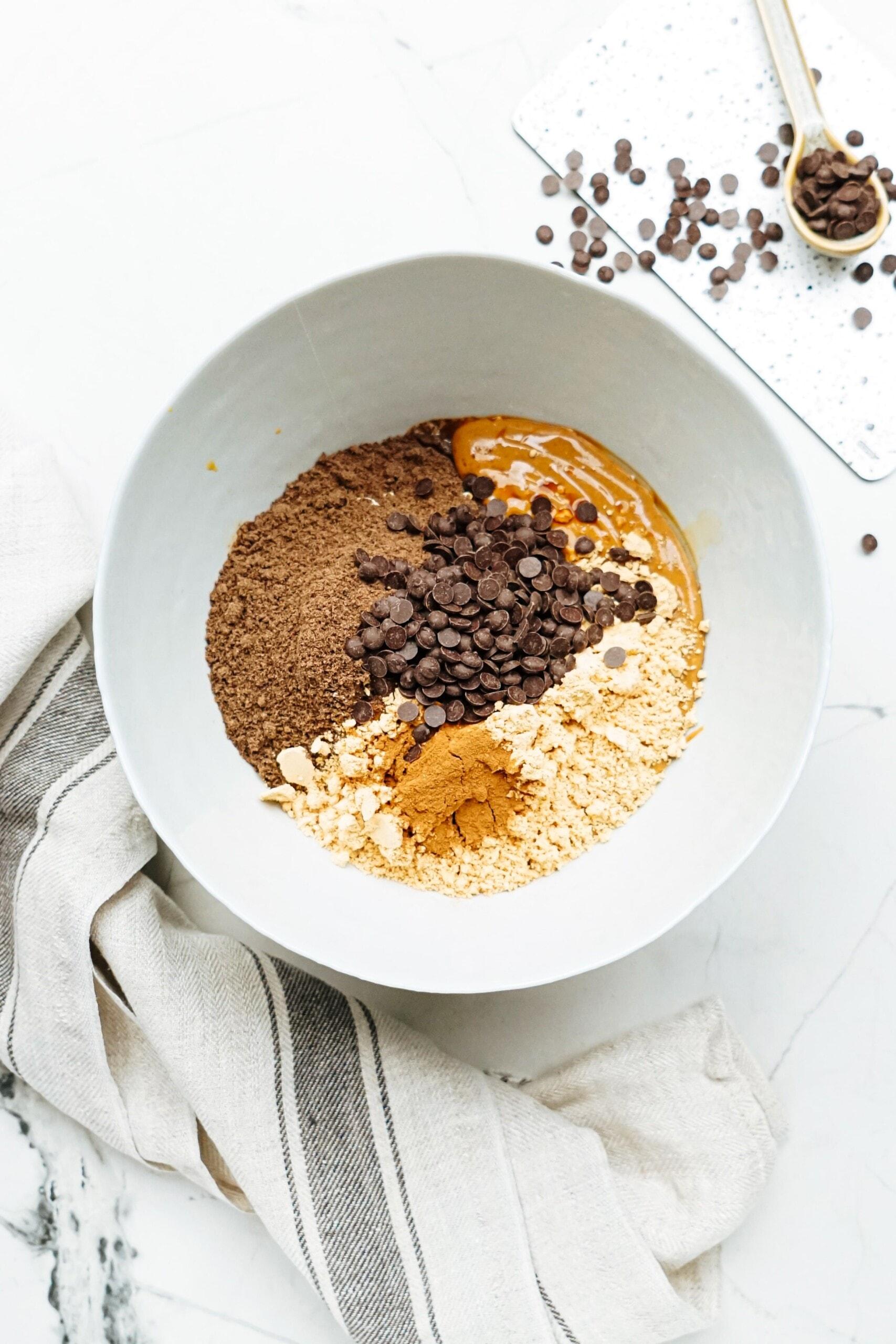 energy ball ingredients in a mixing bowl