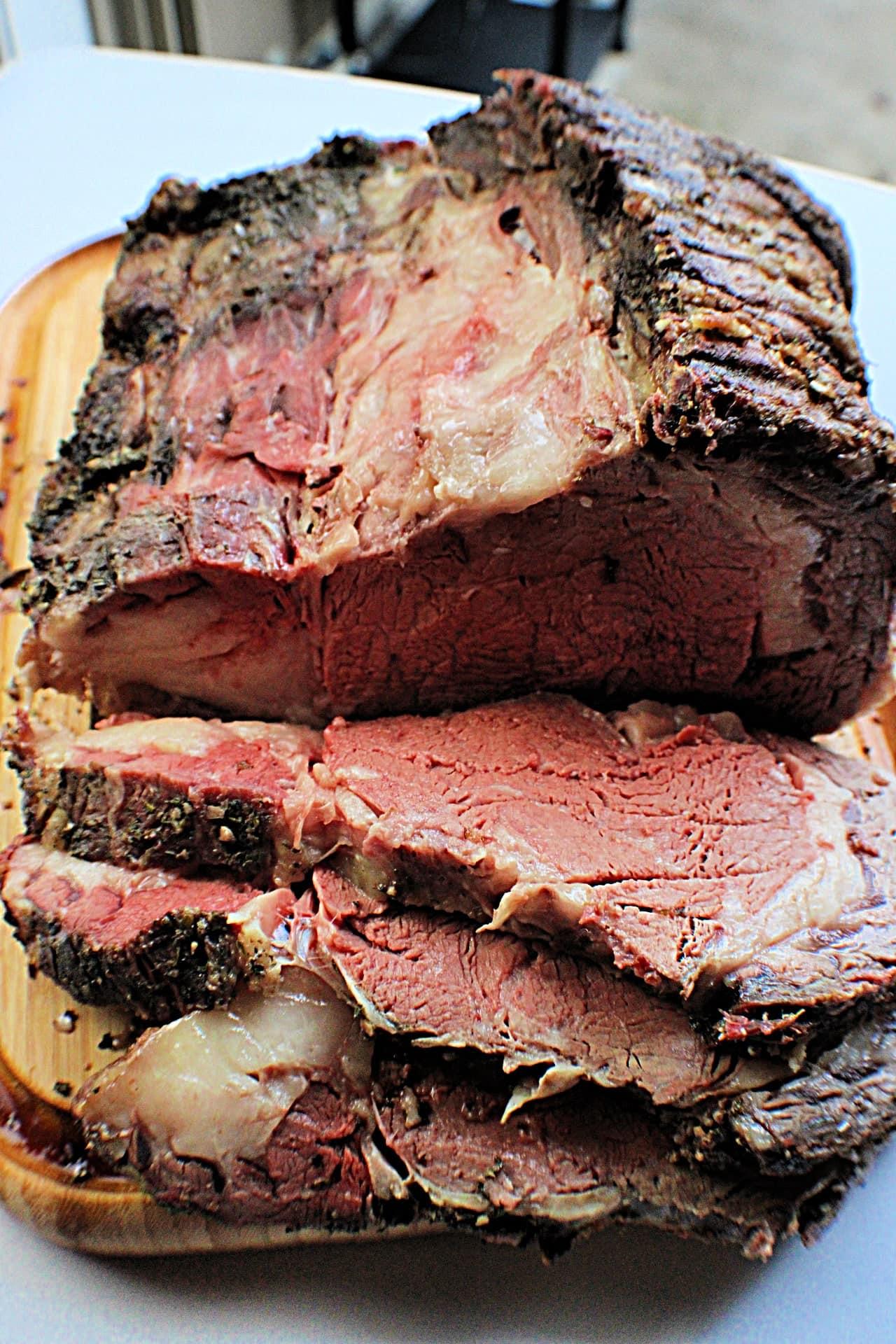 sliced Smoked Prime Rib on a cutting board