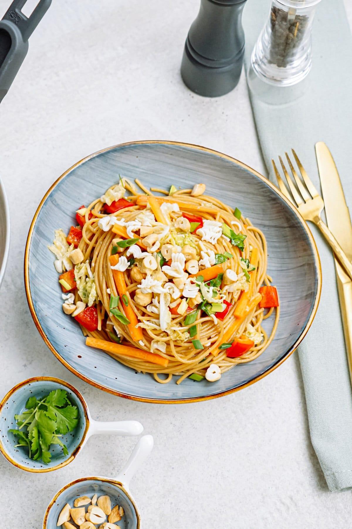 plated noodle salad on a tablescape