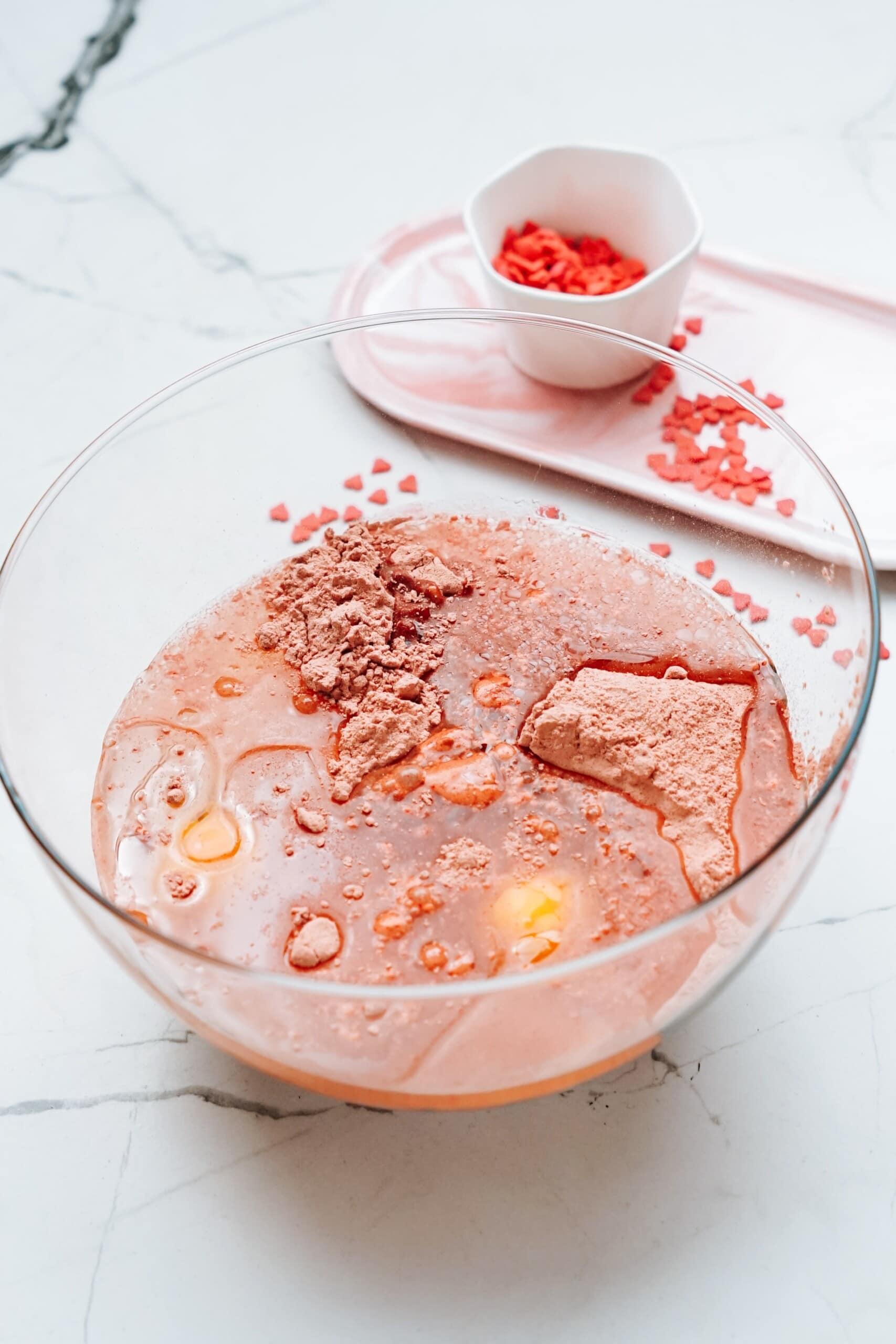 cake mix, water, oil and eggs in a mixing bowl