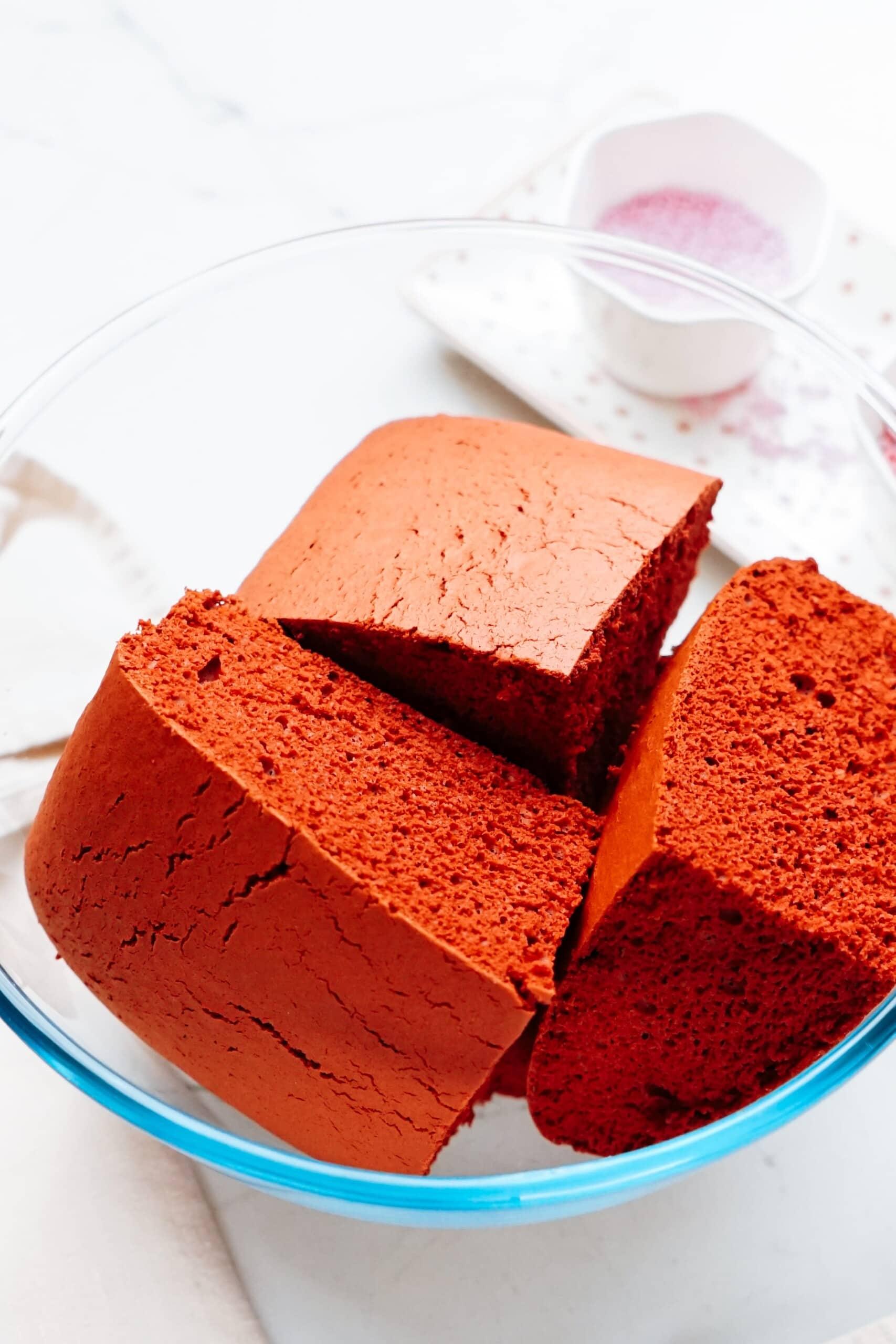 quartered cake pieces in a mixing bowl 