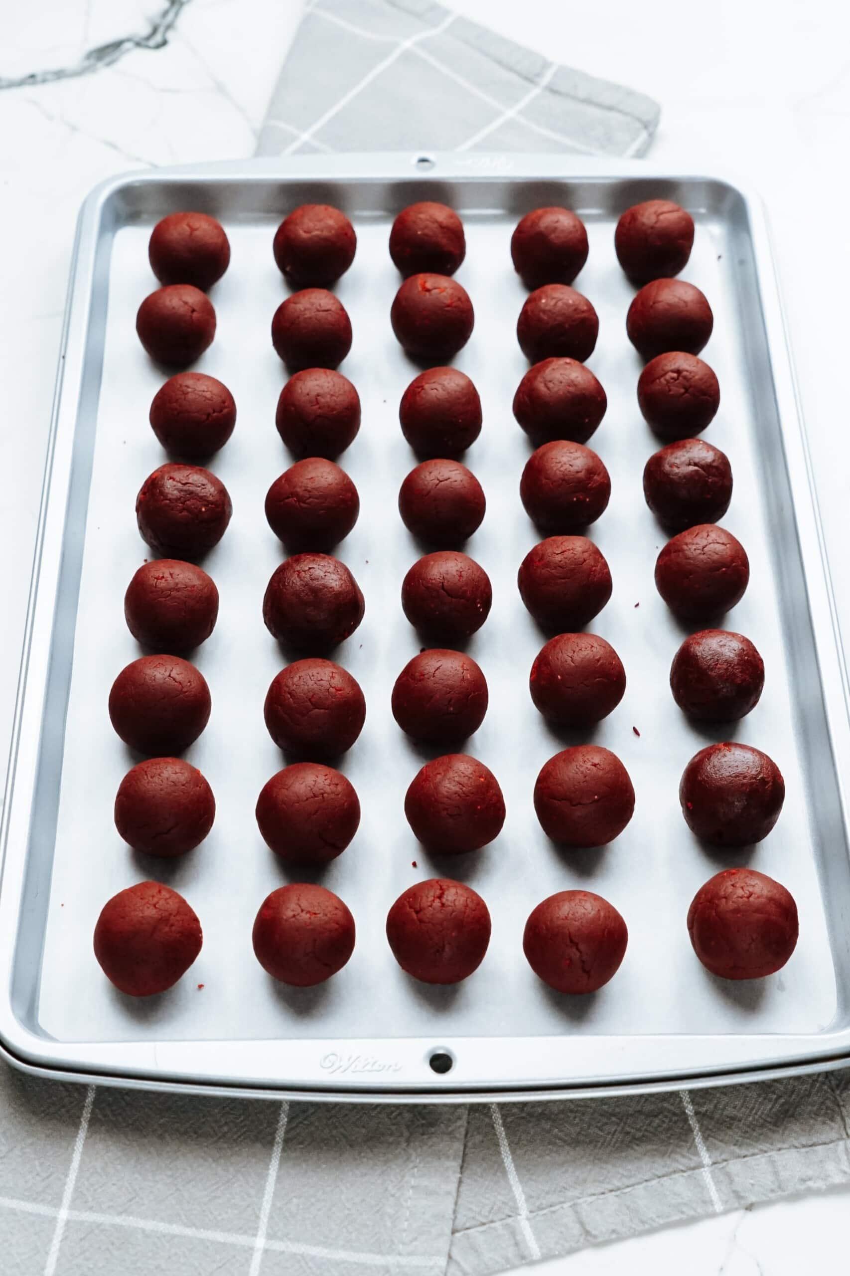 baking sheet full of cake balls 