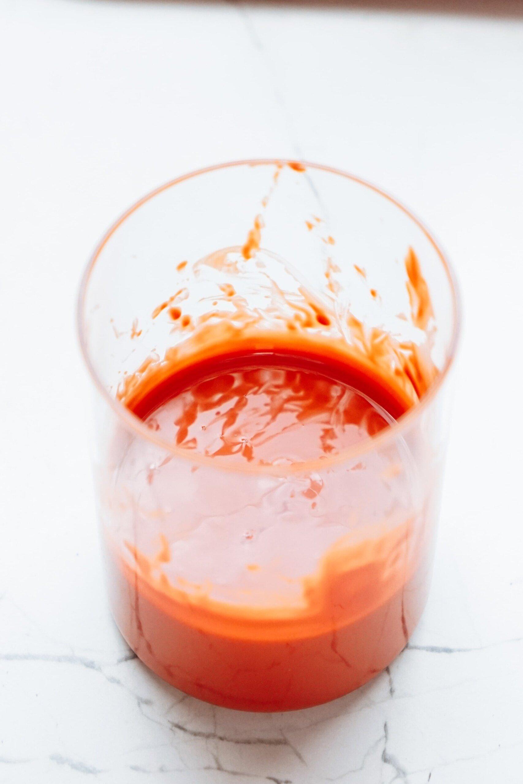 melted chocolate wafers in a glass cup 