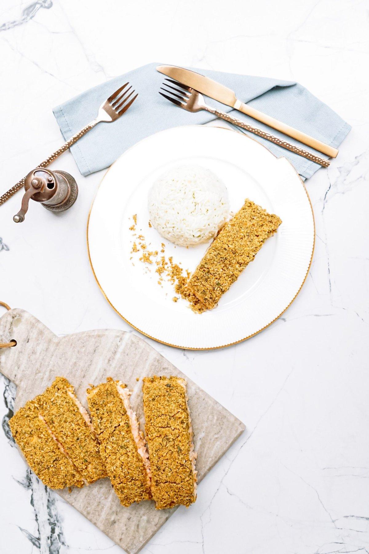 baked salmon plated and on a tablescape