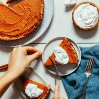 Using a fork to bite into a slice of 1-Bowl Pumpkin Pie