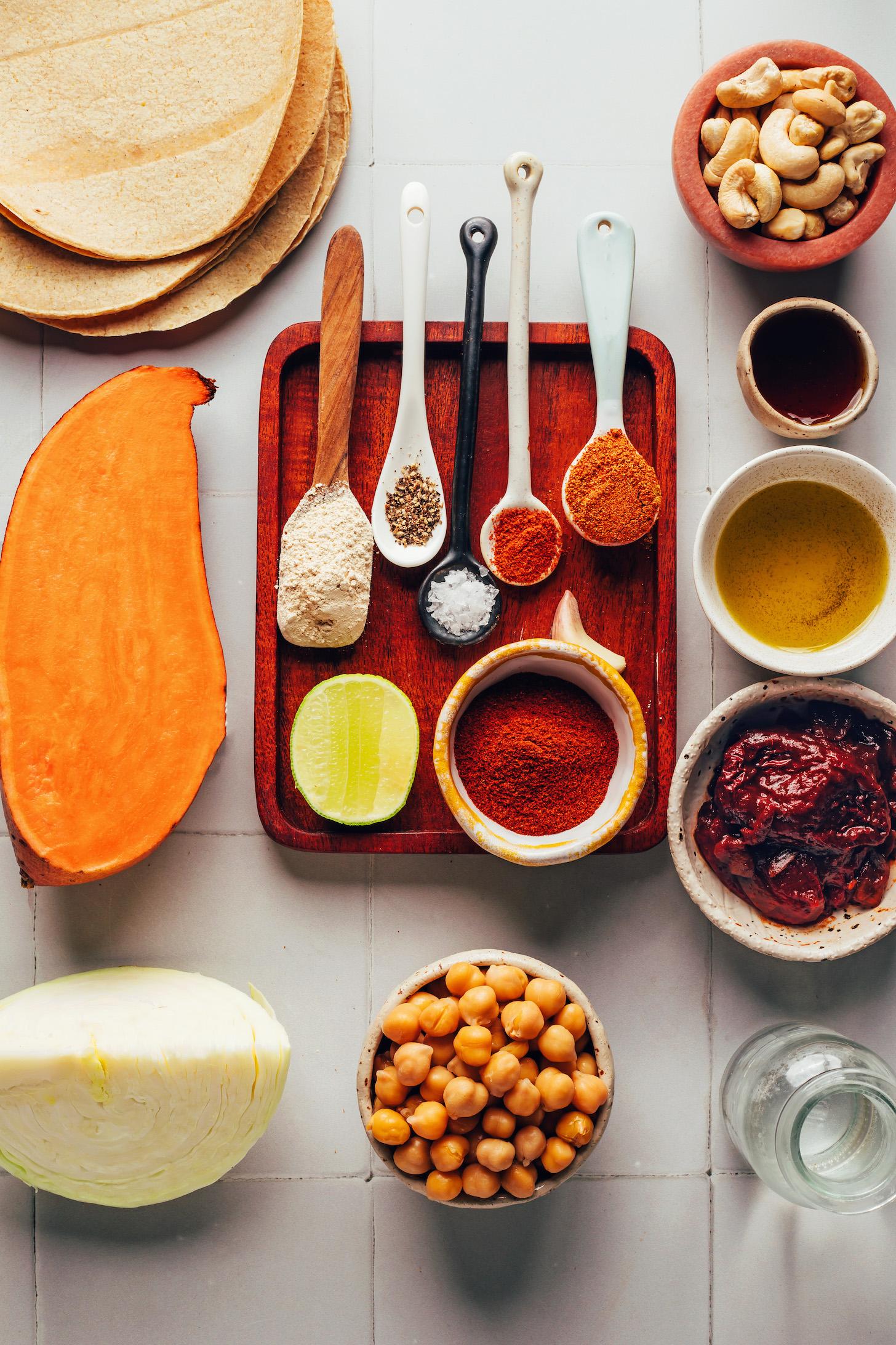 Tortillas, sweet potato, cabbage, chickpeas, chipotle peppers, oil, maple syrup, cashews, spices, and lime