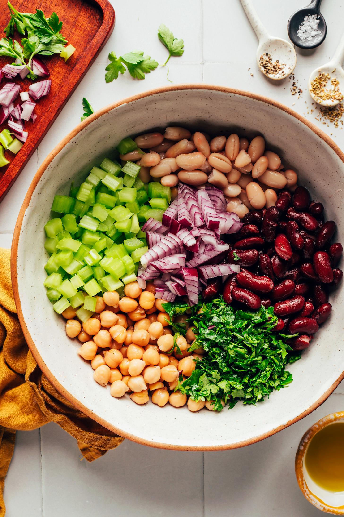 Chopped celery, red onion, parsley, and three types of beans