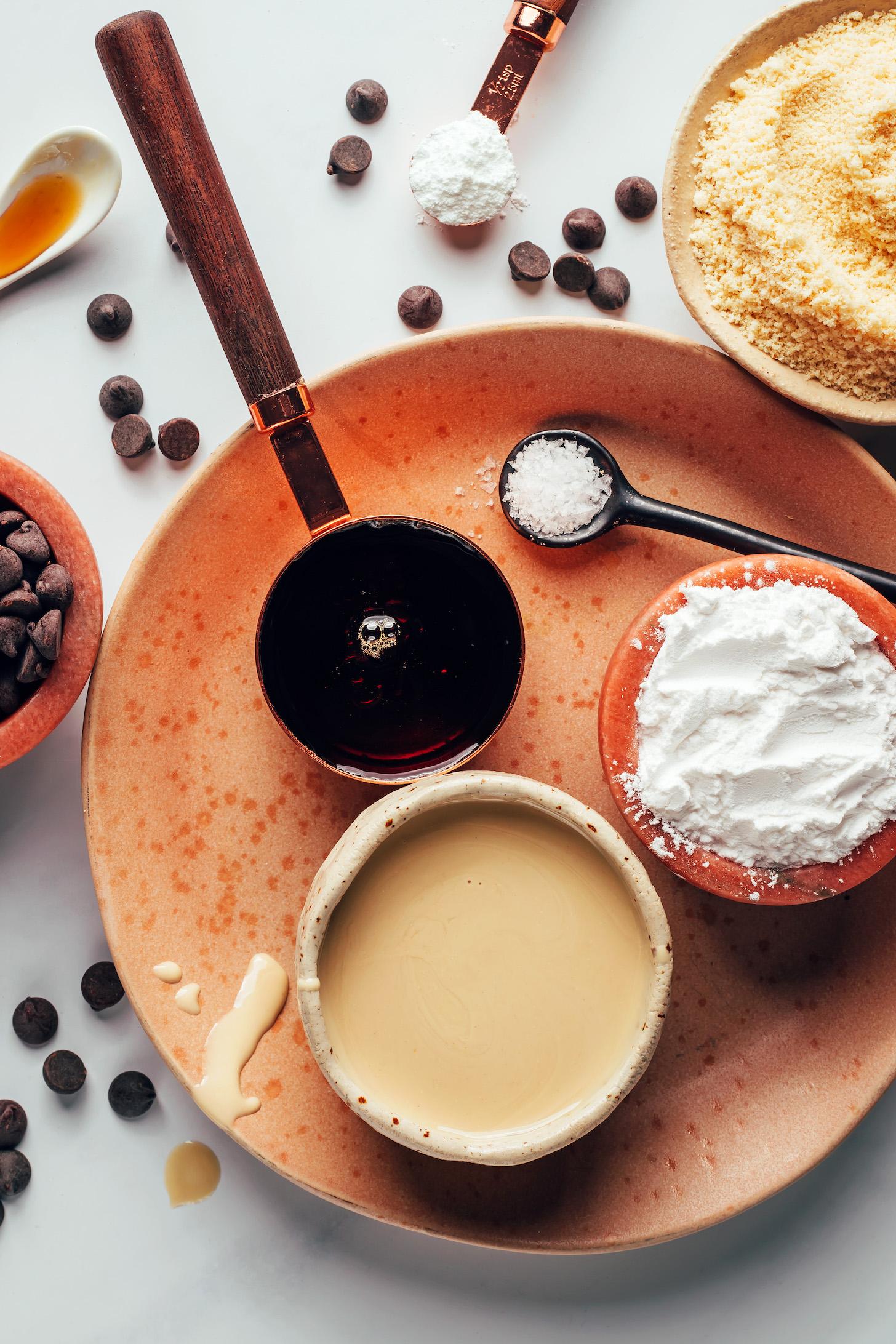 Tahini, maple syrup, chocolate chips, vanilla, baking powder, almond flour, tapioca starch, and salt