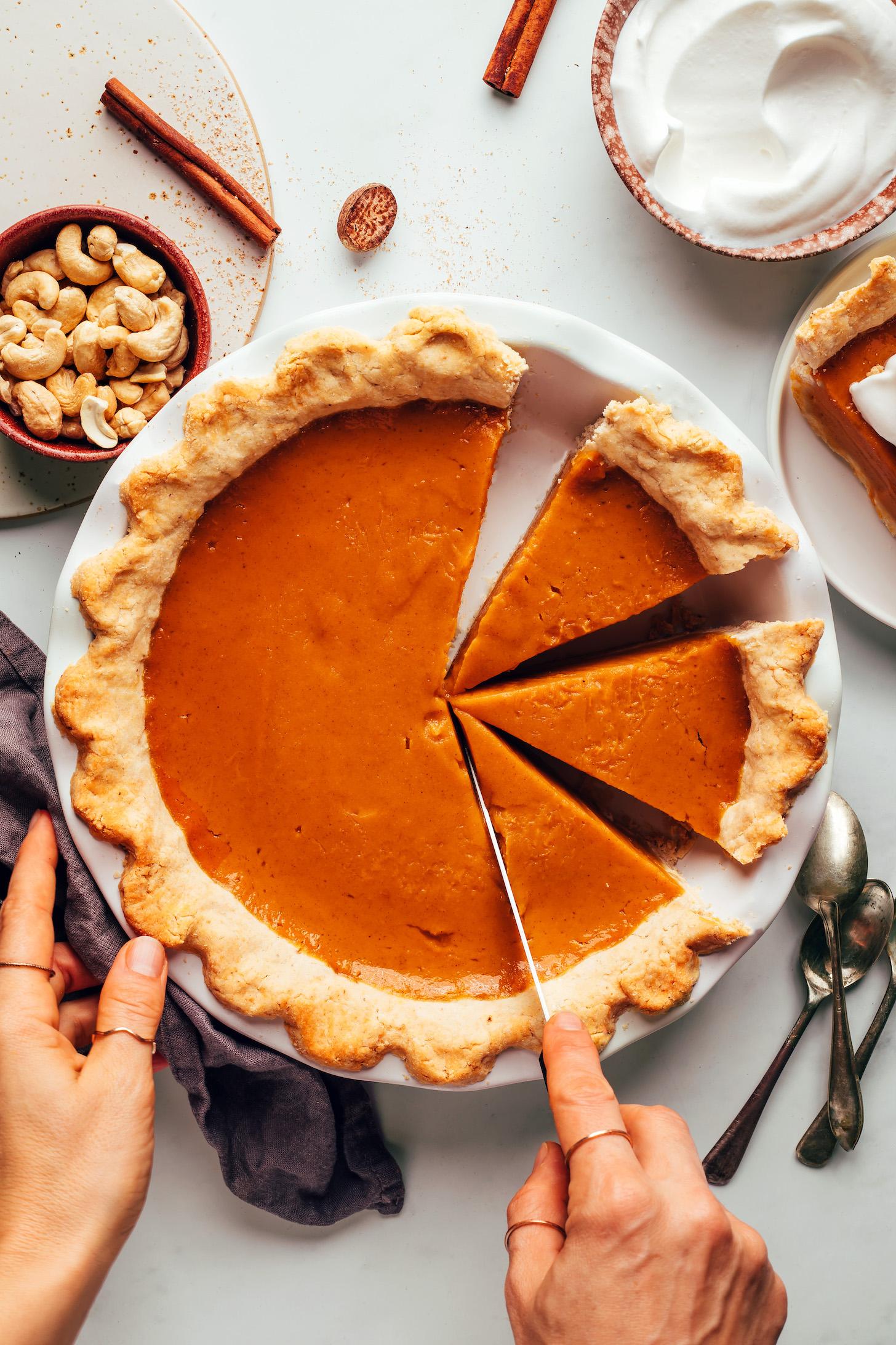 Slicing a vegan gluten-free sweet potato pie