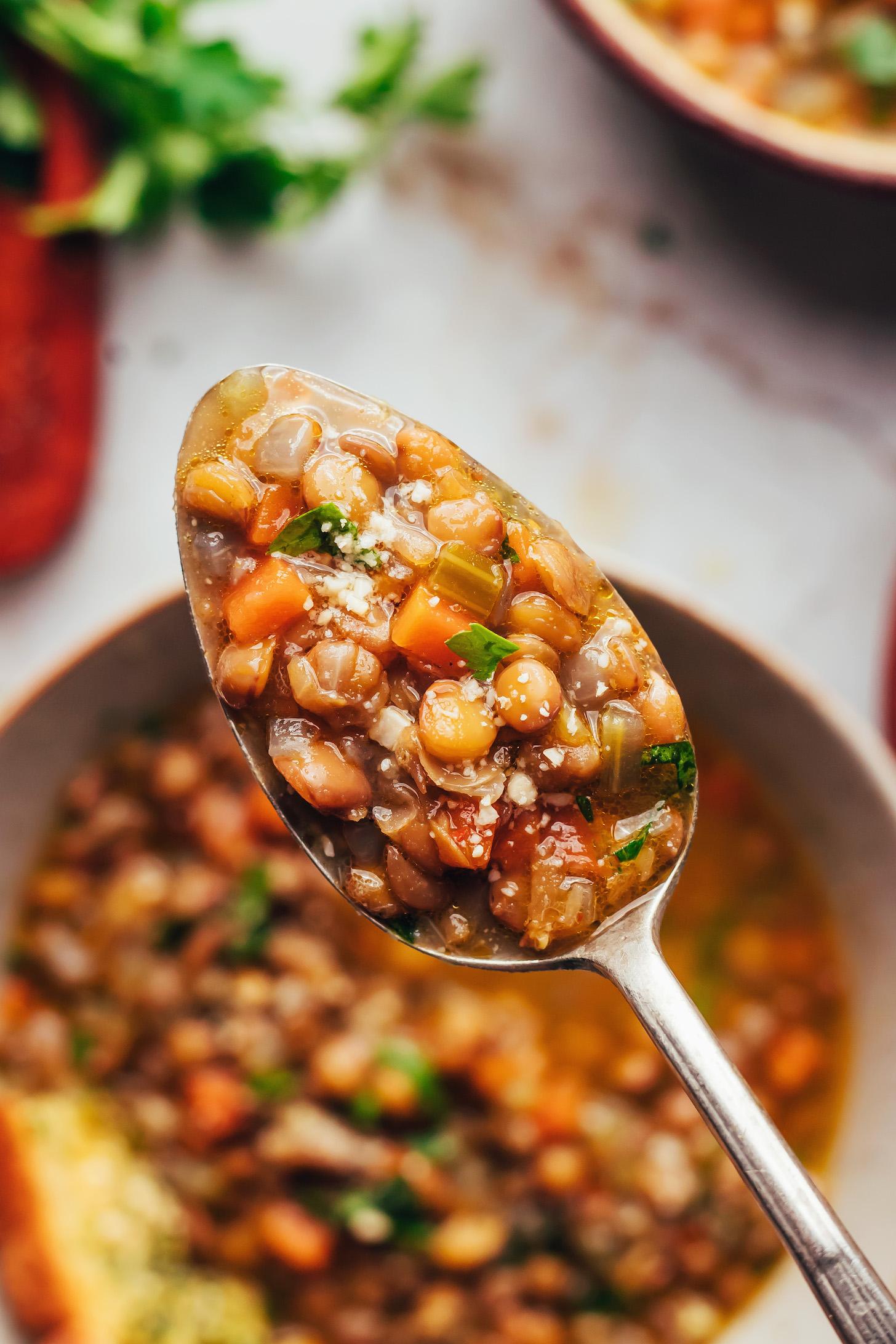 Close up photo of a spoonful of Italian lentil soup (zuppa di lenticchie)