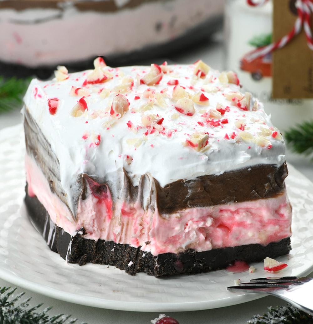 This Christmas layered dessert is rich, chocolaty with the magical flavour of candy canes, peppermint cream cheese filing.