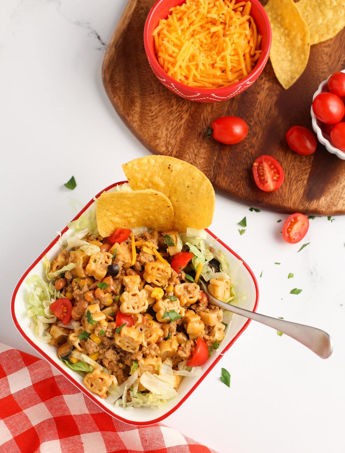 One serving of Turkey Taco Pasta with Tortilla chip