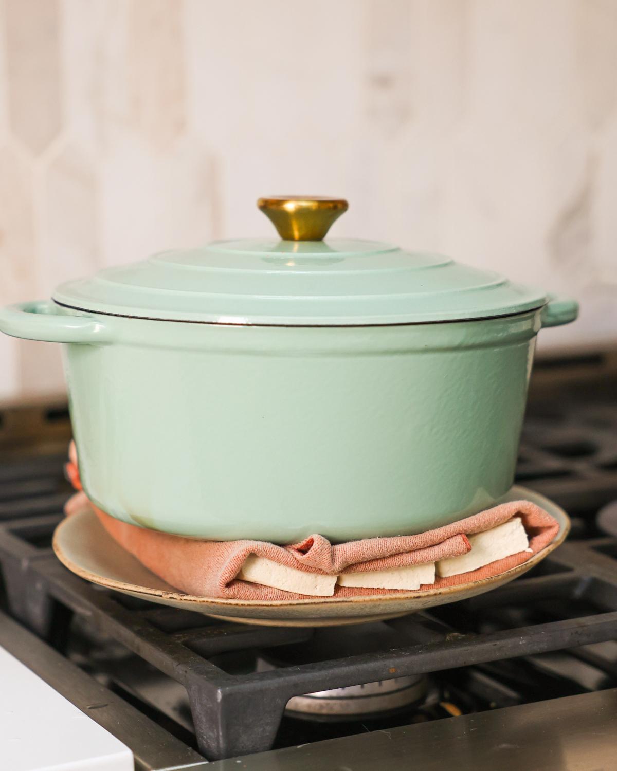 heavy pot on top of tofu
