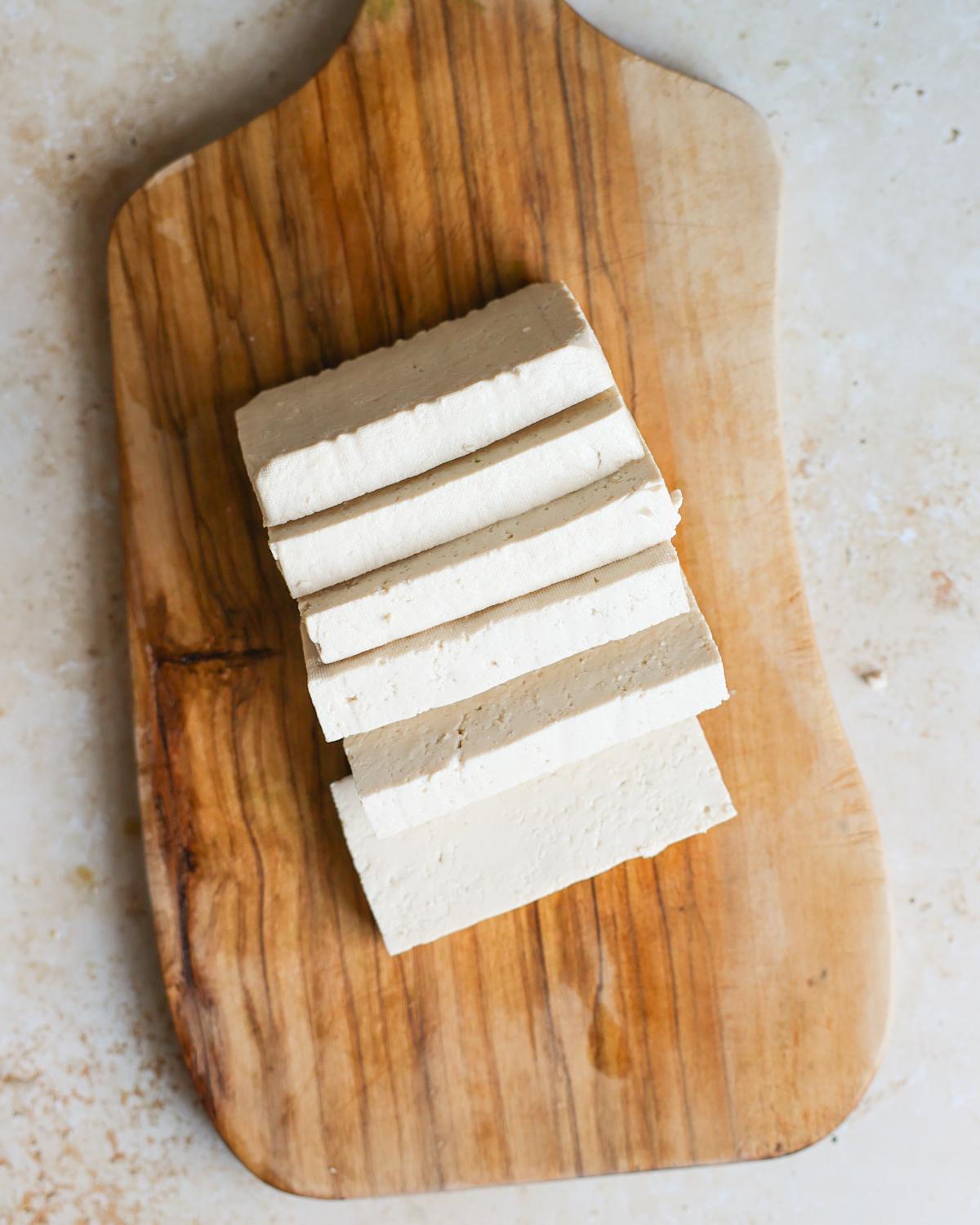 overhead sliced tofu on cutting board