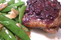 Duck Roast with blueberry sauce, and snap peas