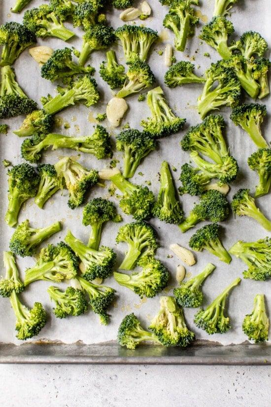 broccoli and garlic on a sheet pan