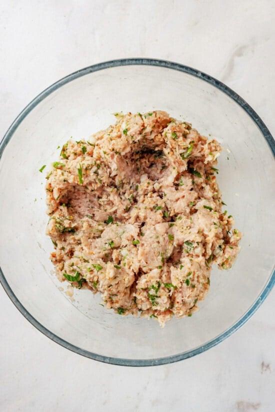 Turkey meatball mixture in a glass bowl