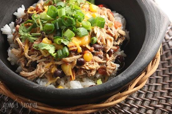 Slow cooker shredded chicken with corn, tomatoes and black beans. Prep this the night before and turn your crock pot on in the morning for an easy weeknight meal.