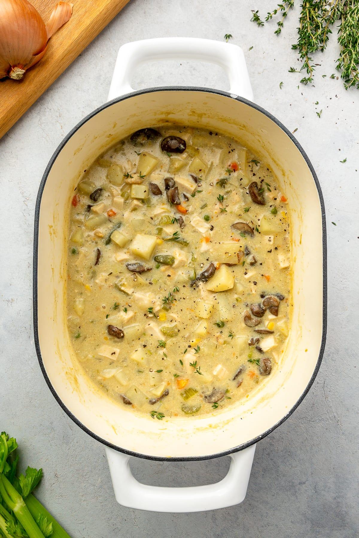 Chicken Pot Pie Soup in a dutch oven.